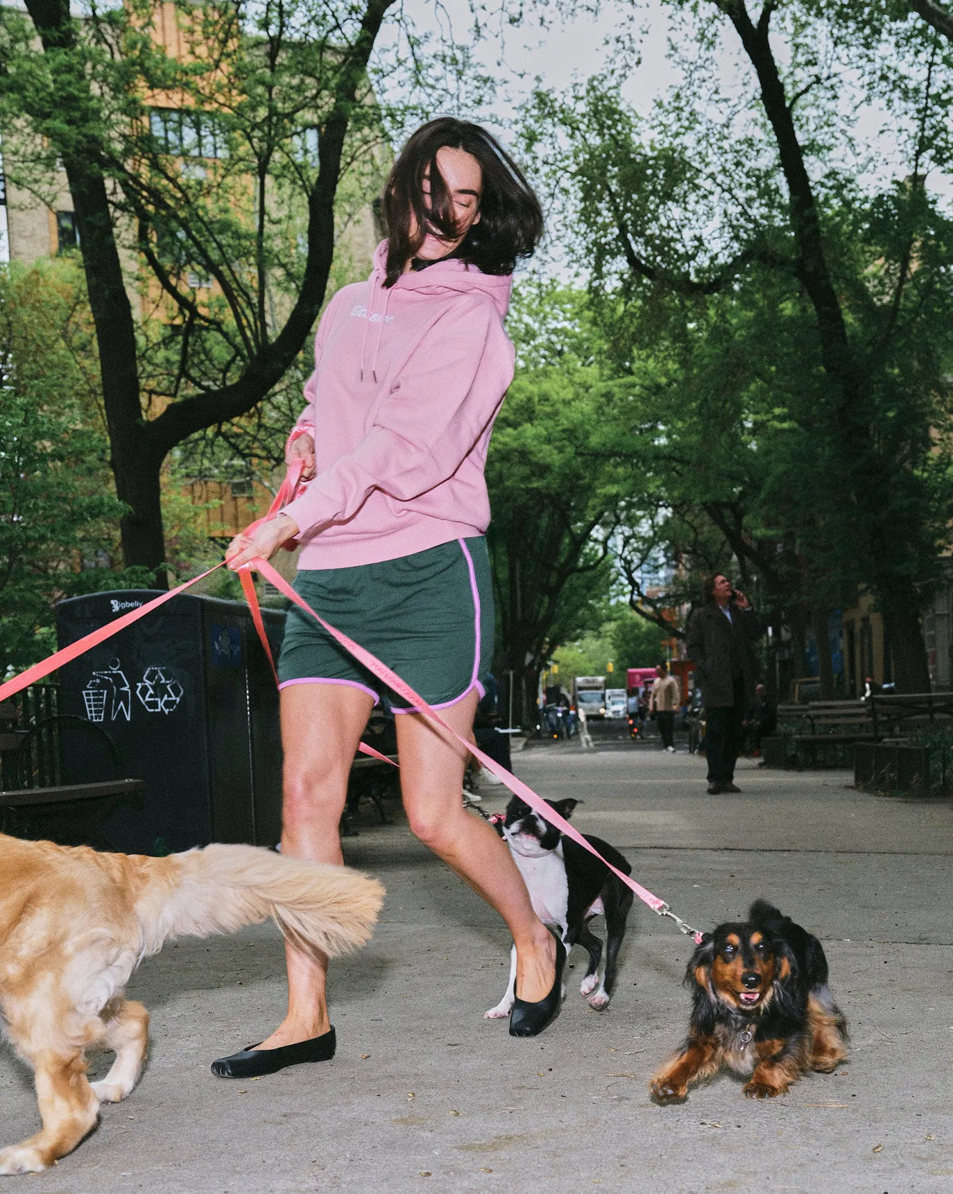 Georgia wears the Embroidered Pink Hoodie in size L.