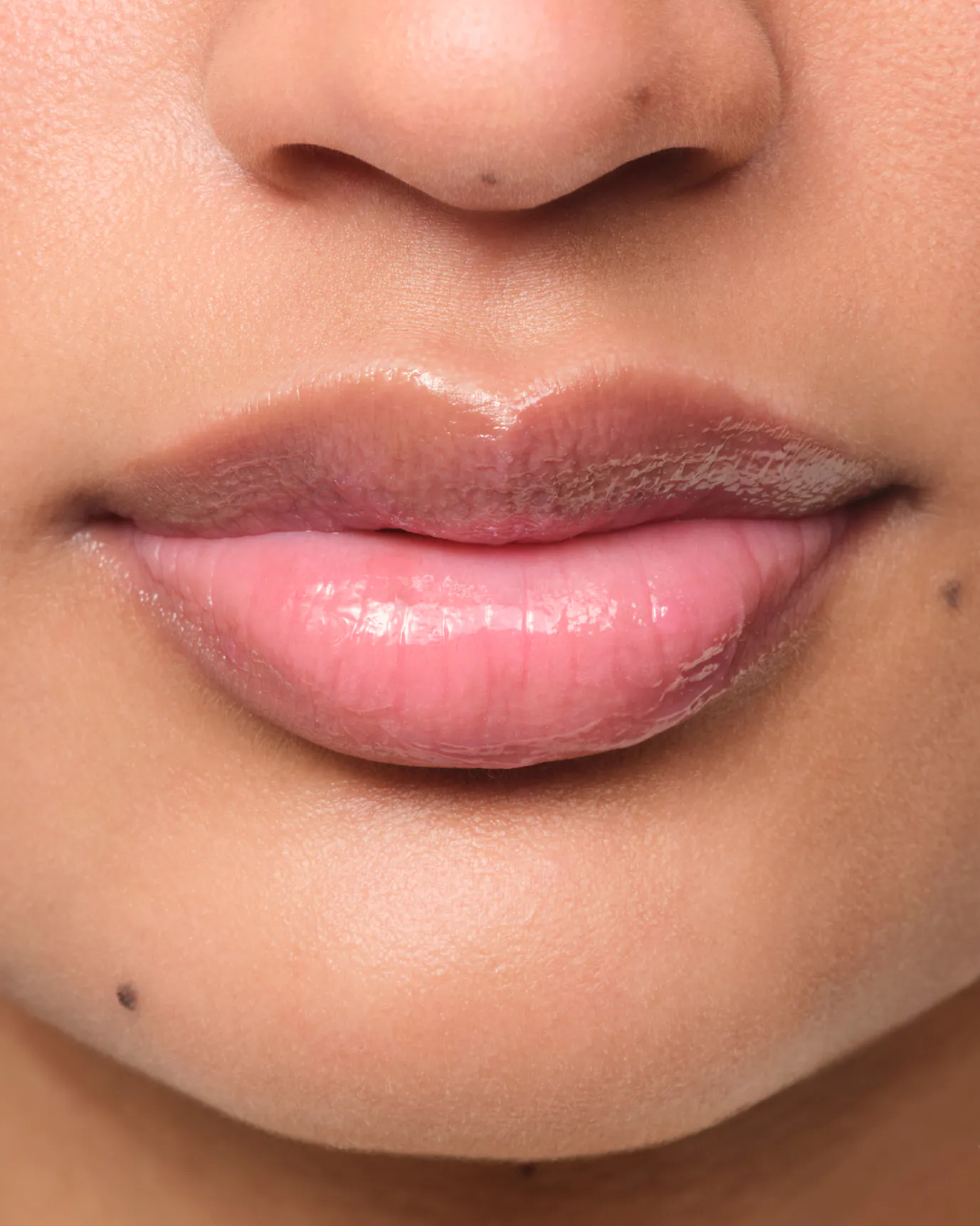 Thasfia wears Rose Balm Dotcom.