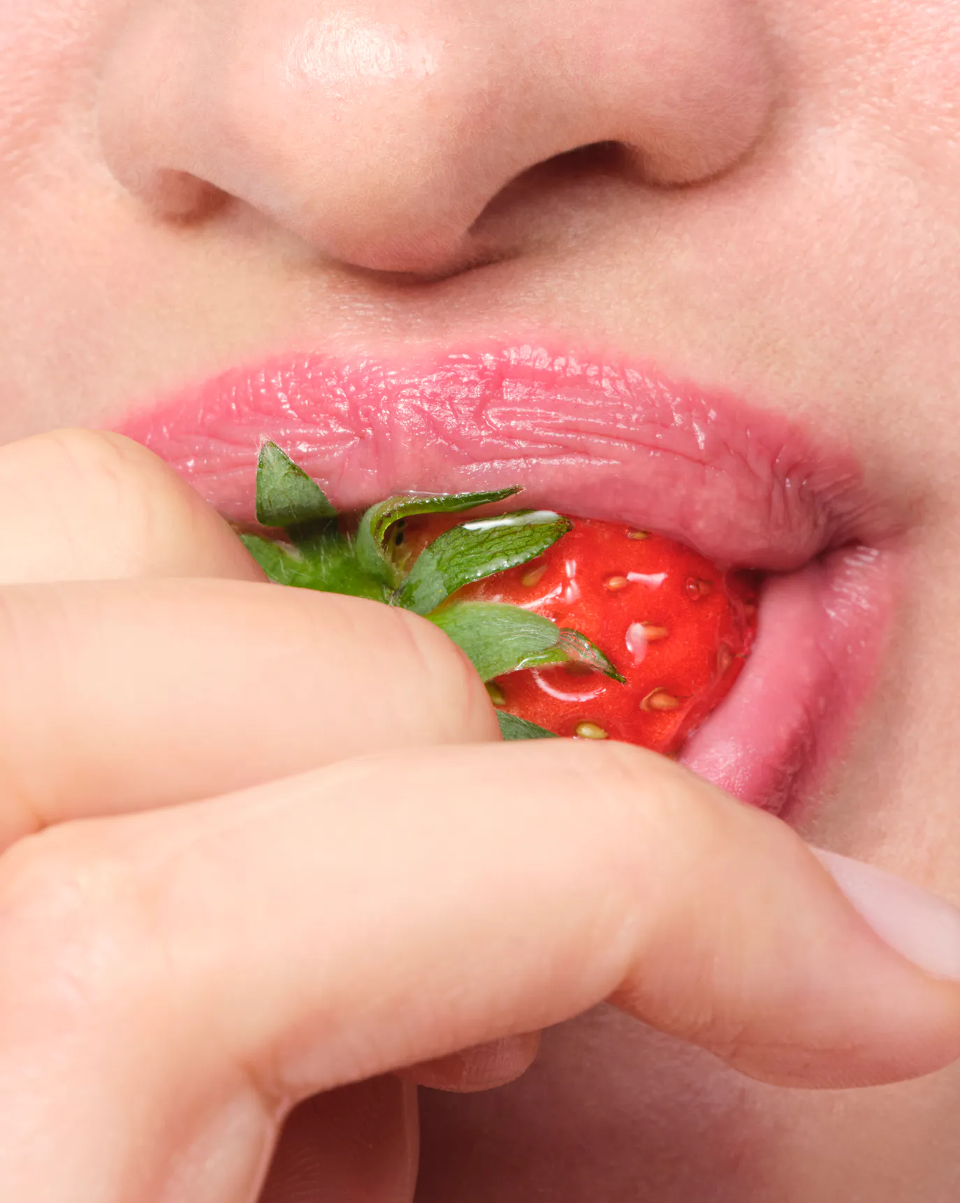 Barbara wears Strawberry Balm Dotcom.