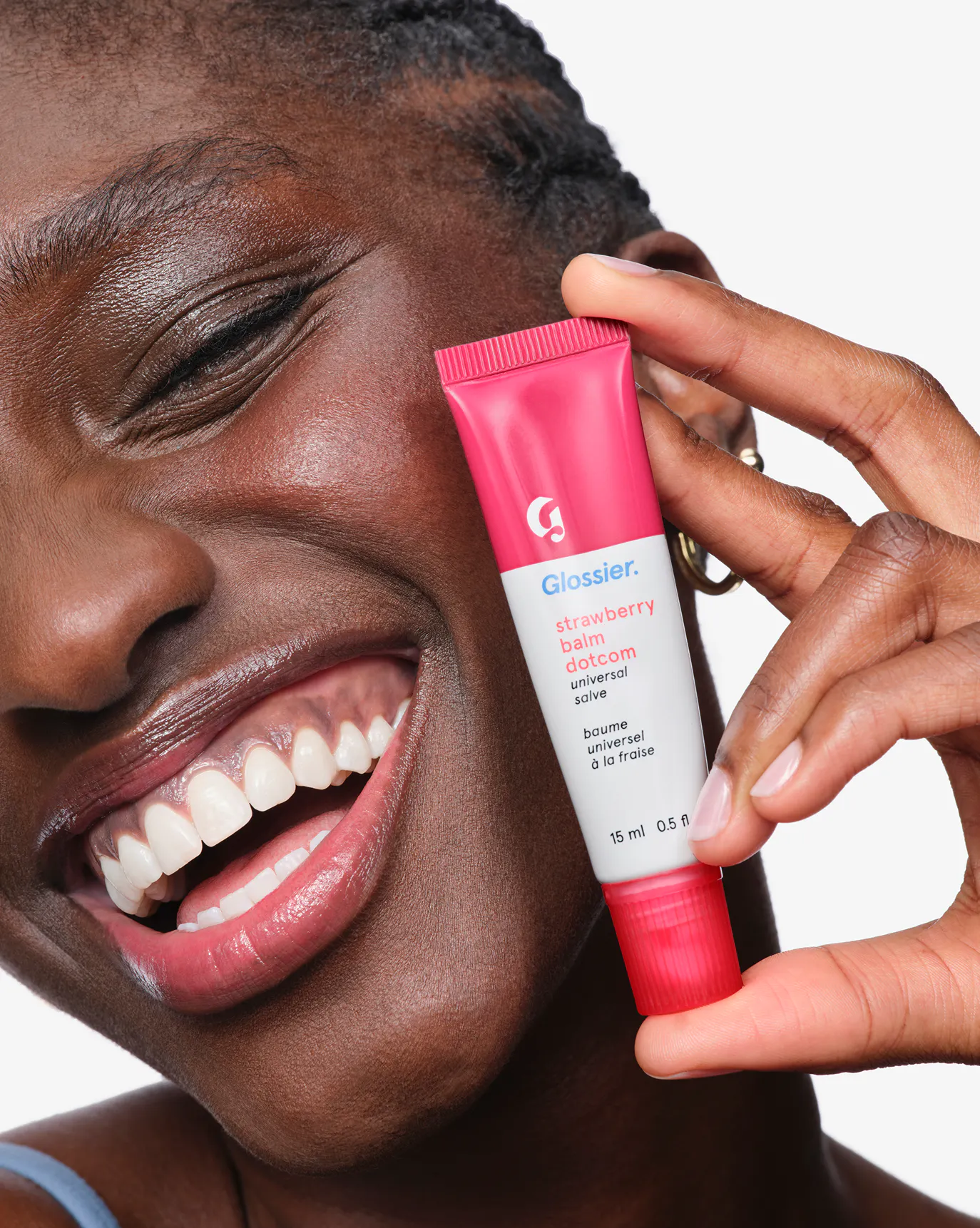 Mariama wears Strawberry Balm Dotcom.