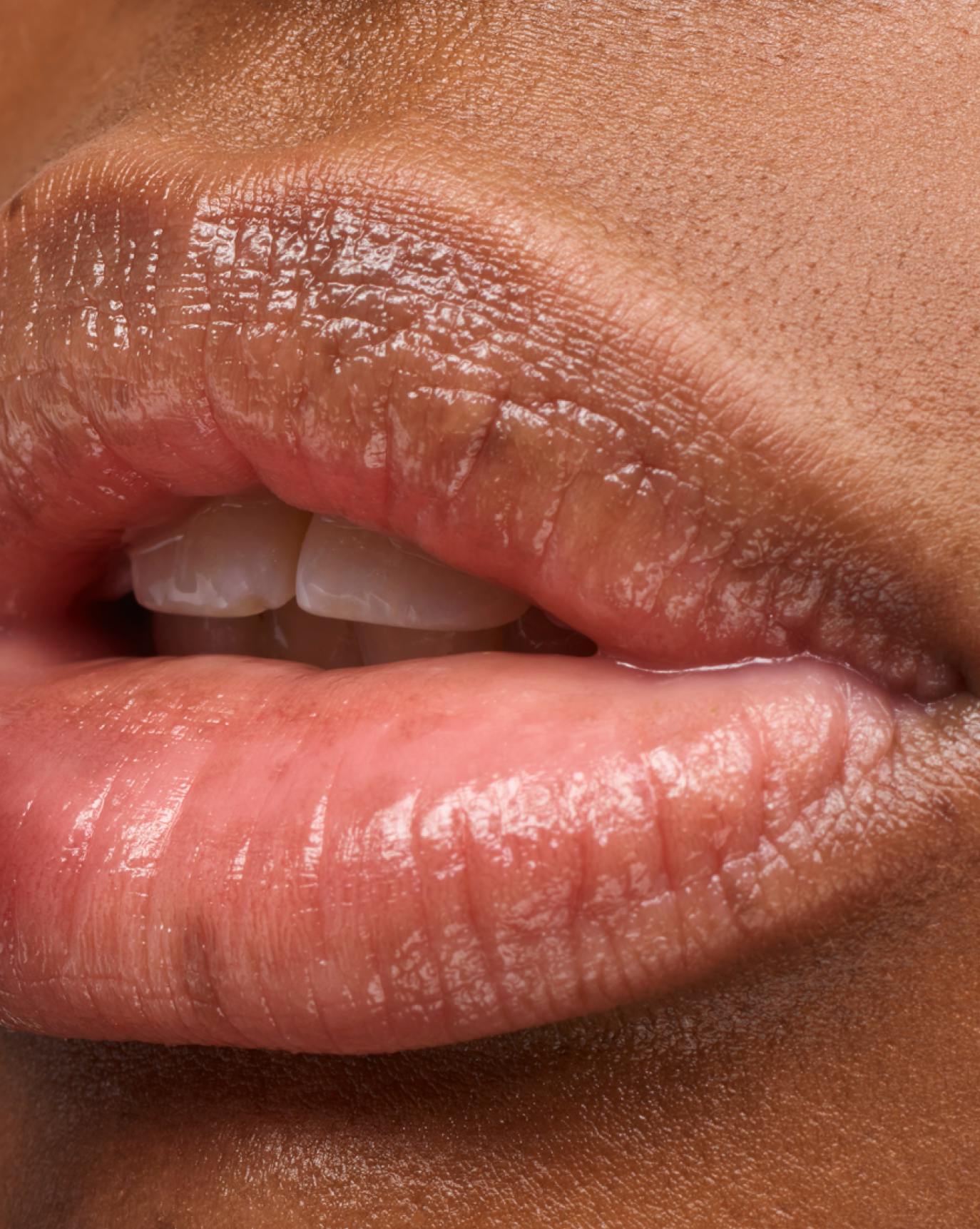 Dione wears Mango Balm Dotcom.