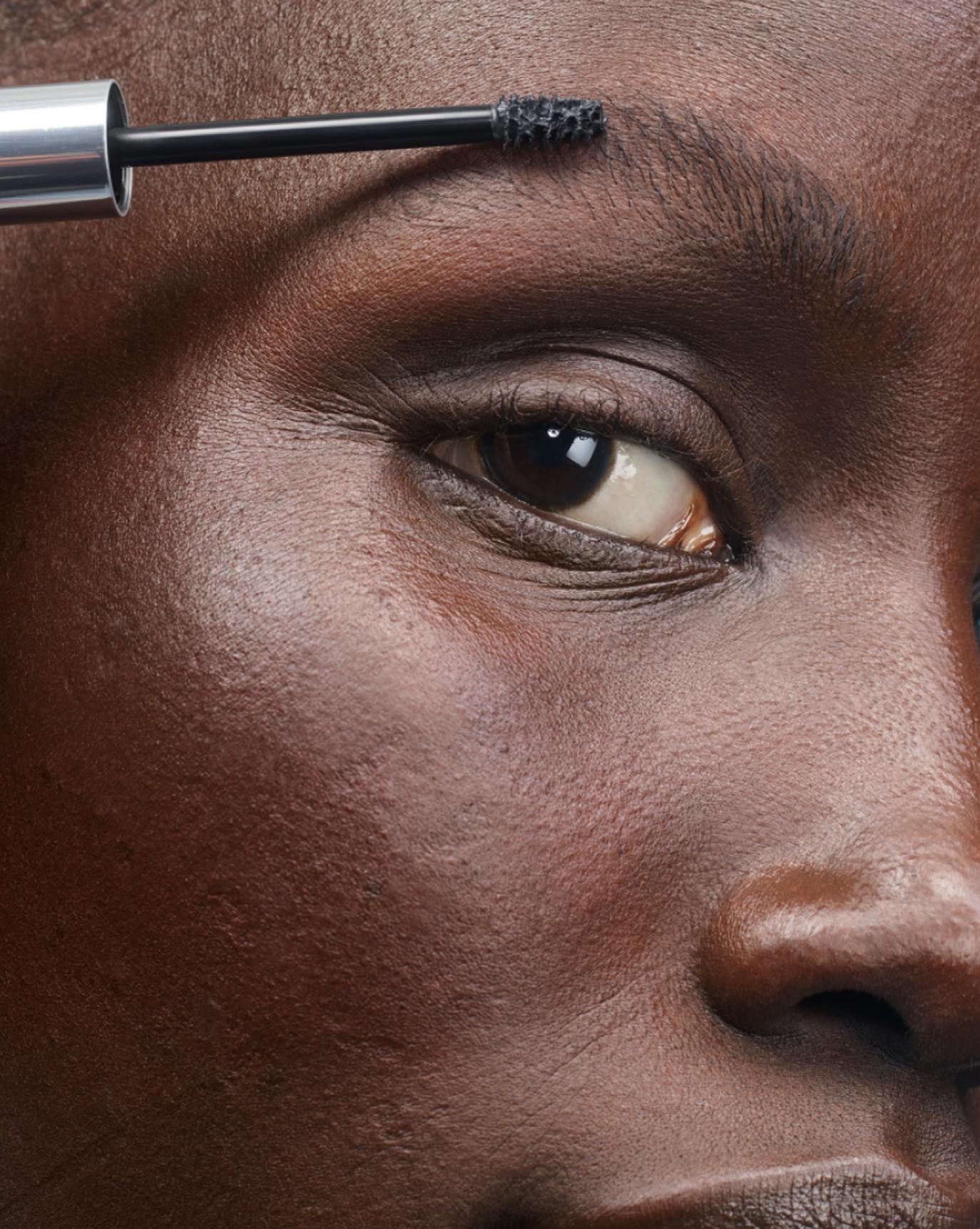 Awoui wears Boy Brow in Black.