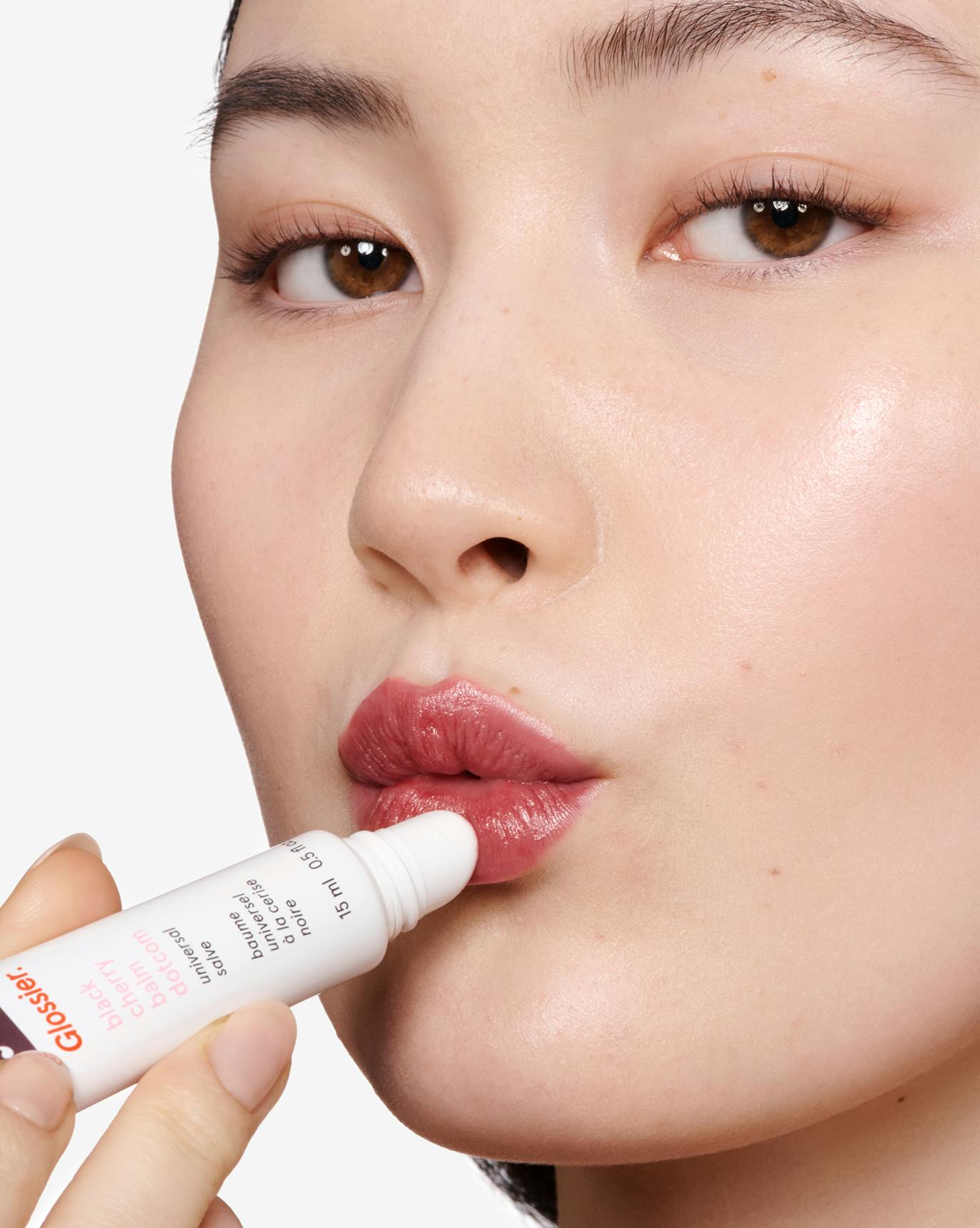 Tallulah wears Black Cherry Balm Dotcom.