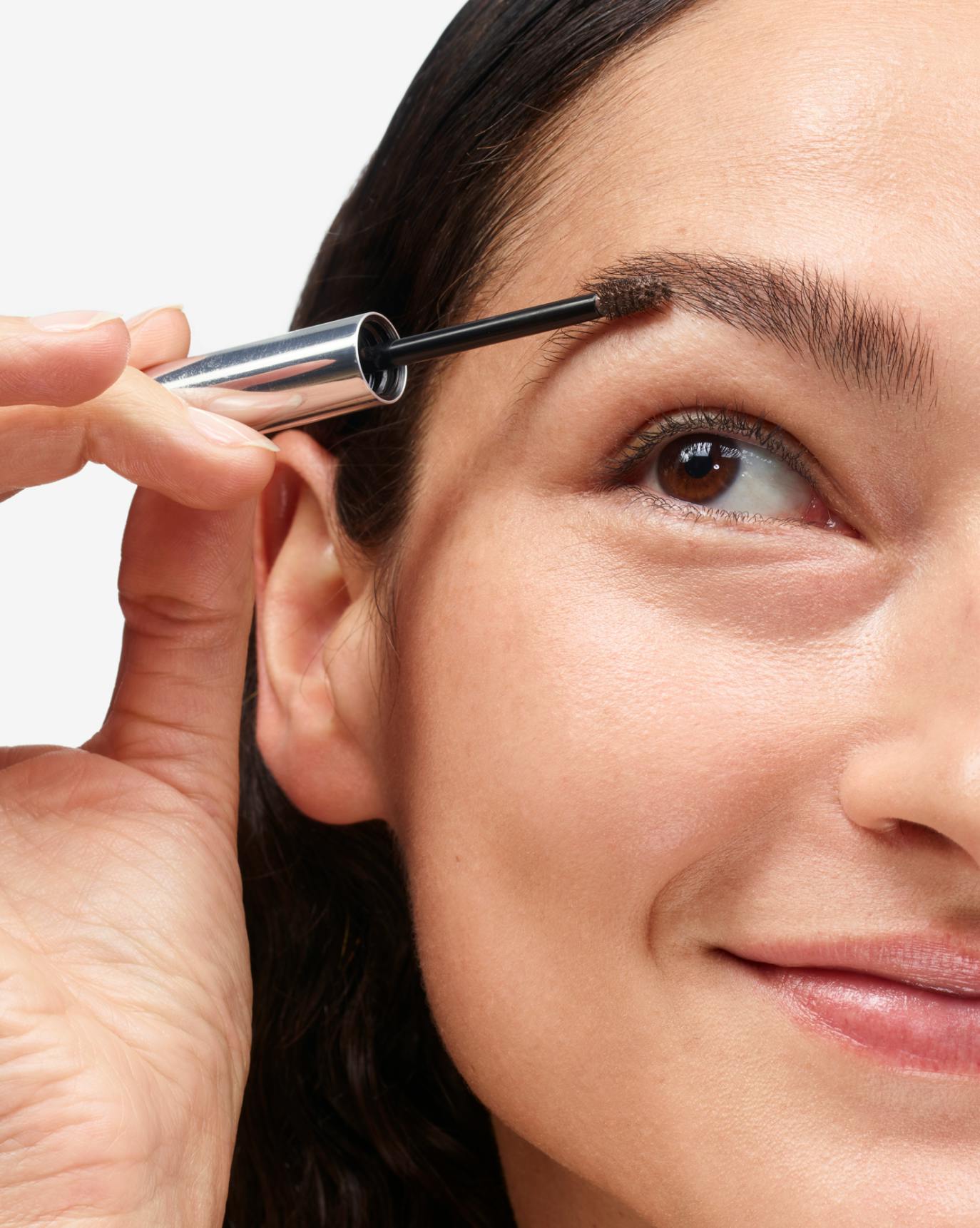 Bruna wears Boy Brow in Brown.