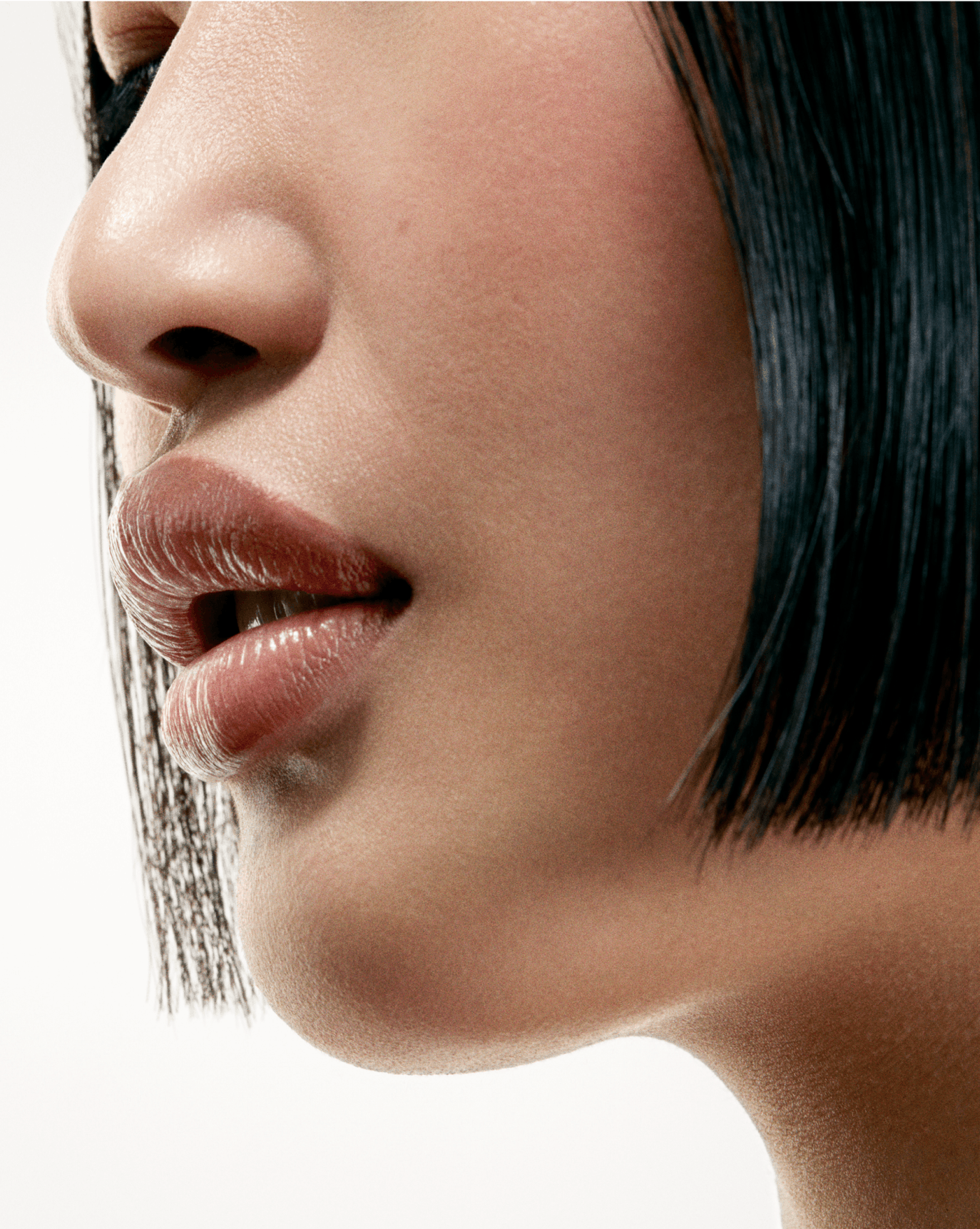 Jeanne wears Lip Line in Buff.