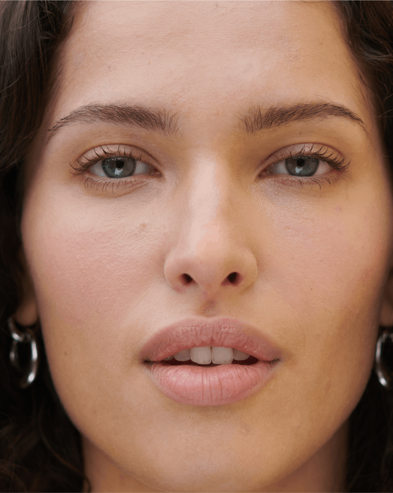 Fidan wears Lip Line in Graze.