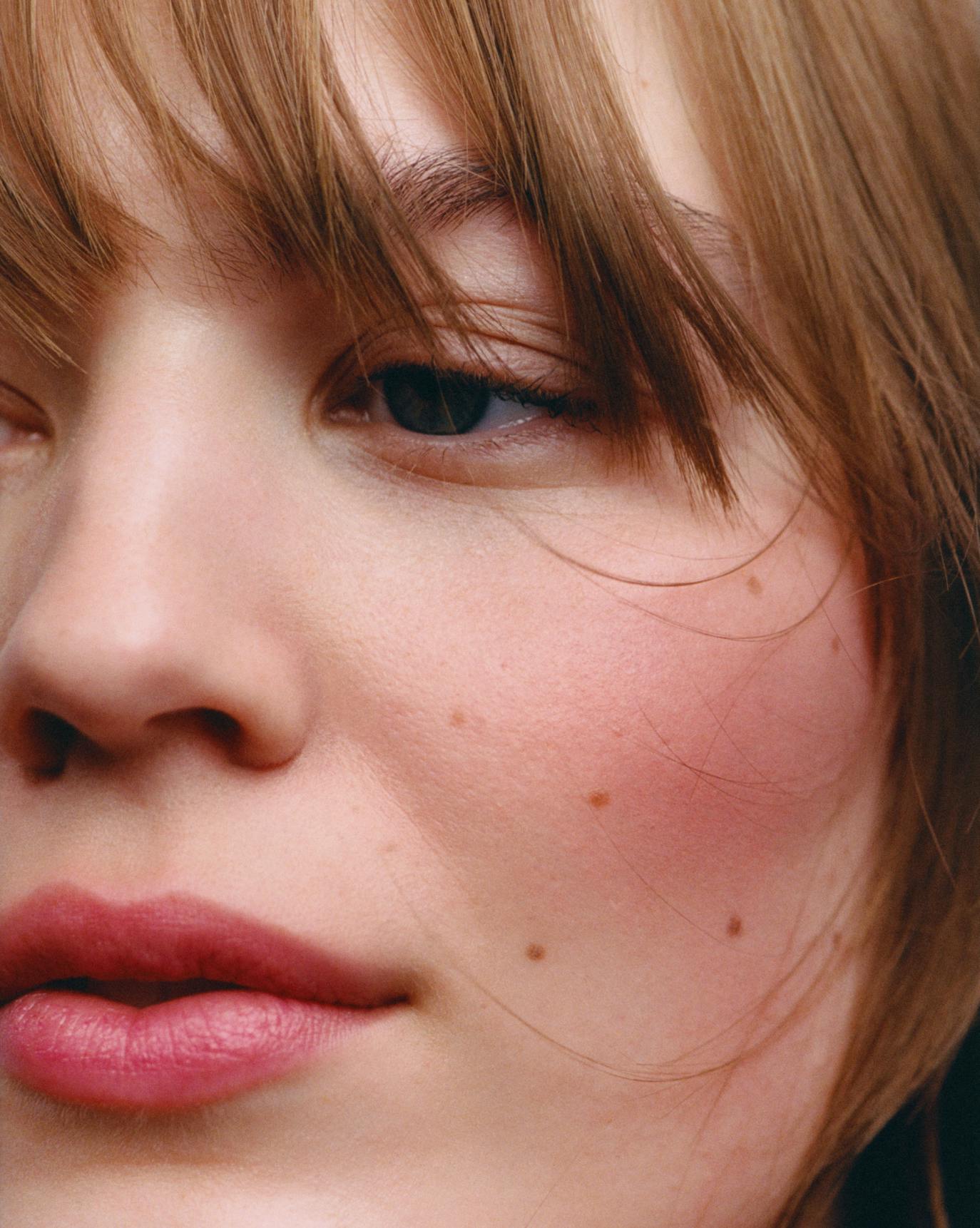 Model wears cloud paint in soar