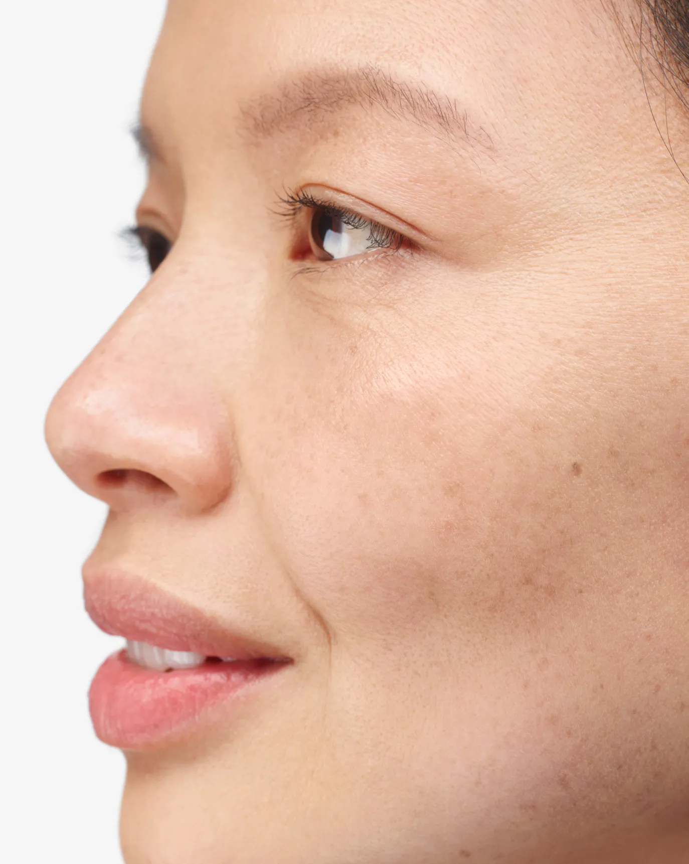 Christine in Stretch Balm Concealer, L5.