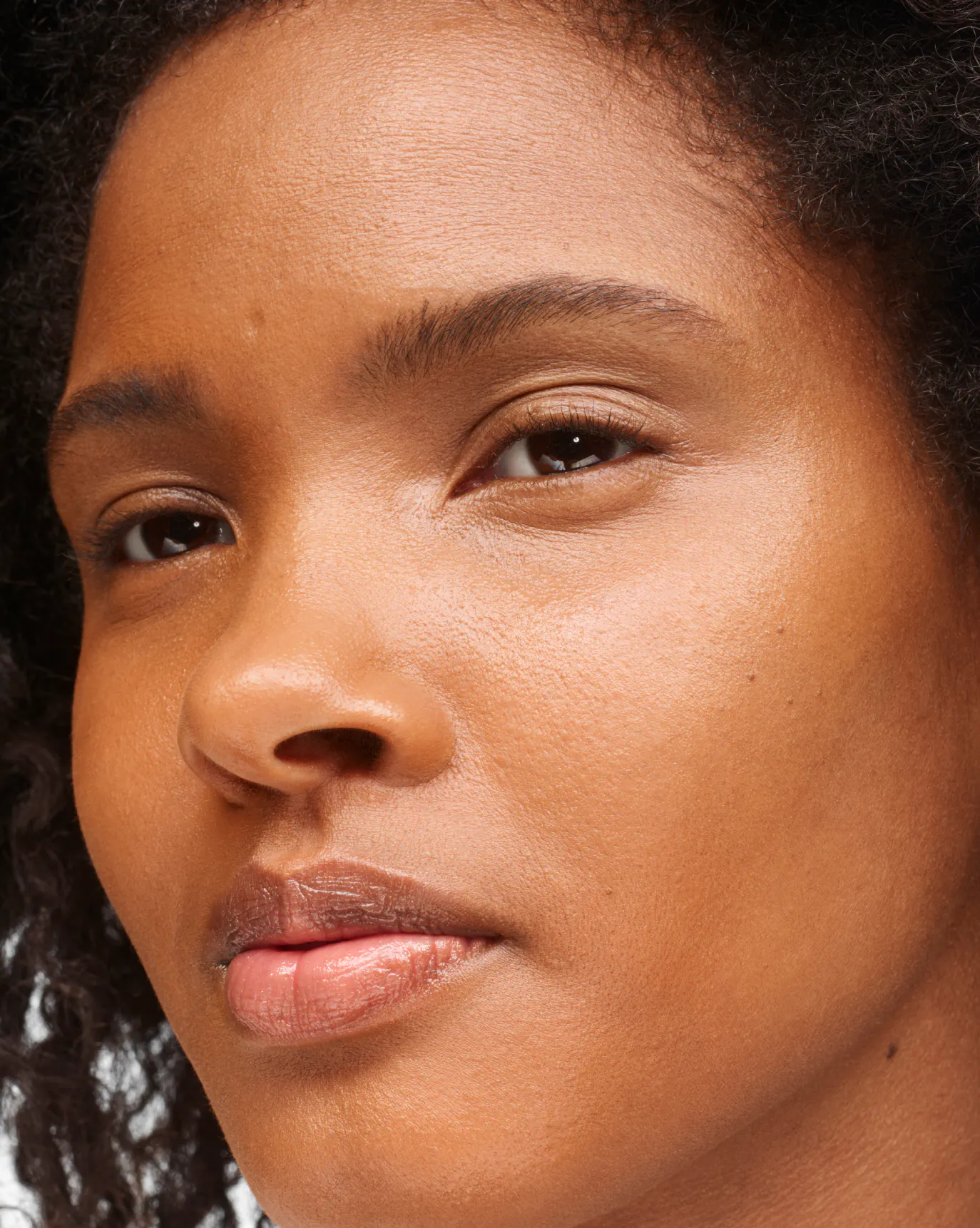 Thaina in Stretch Balm Concealer, MD1.