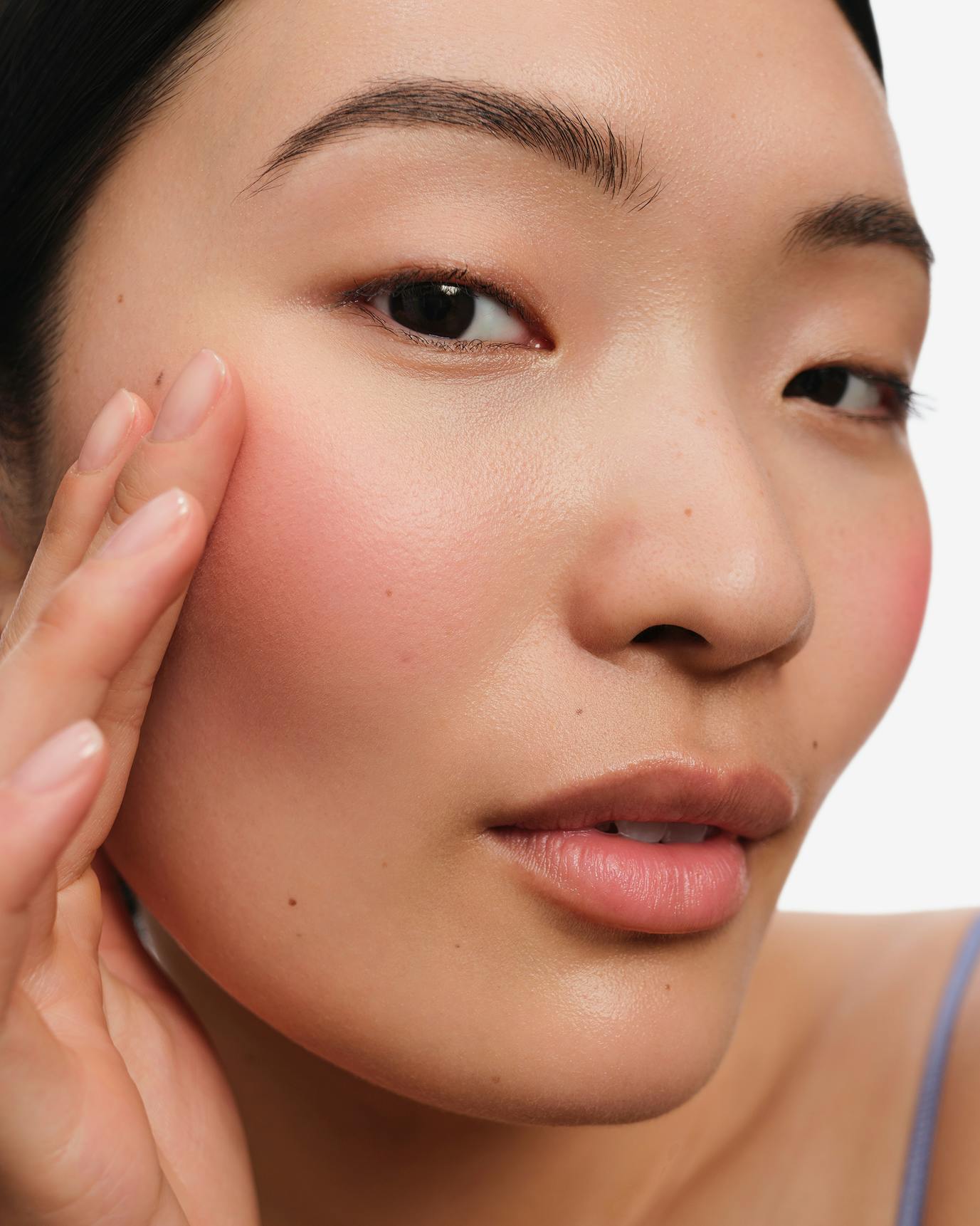 Chris wears Cloud Paint Plush Blush in Puff.
