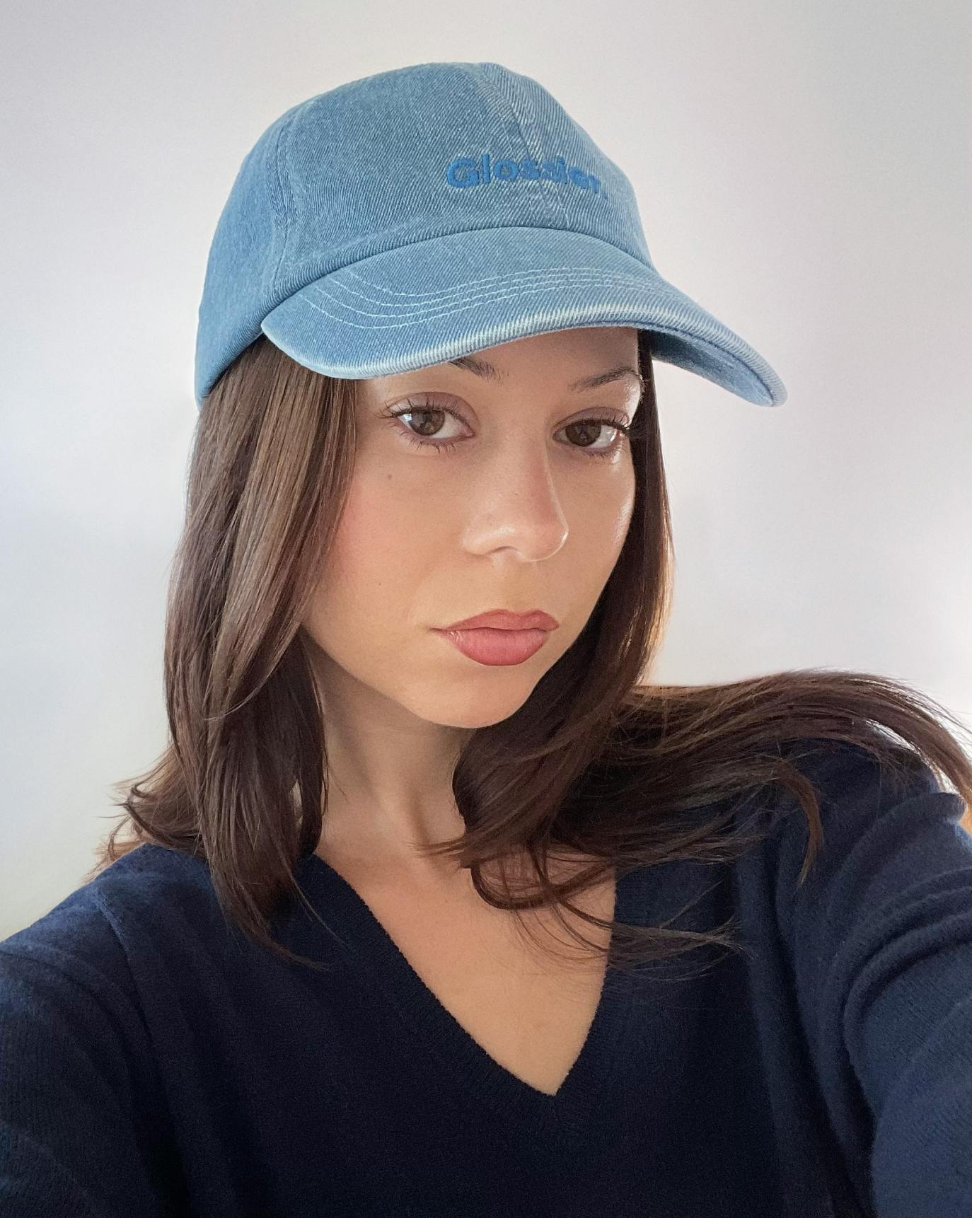 Brigitte wears our Classic Cap in Blue Denim