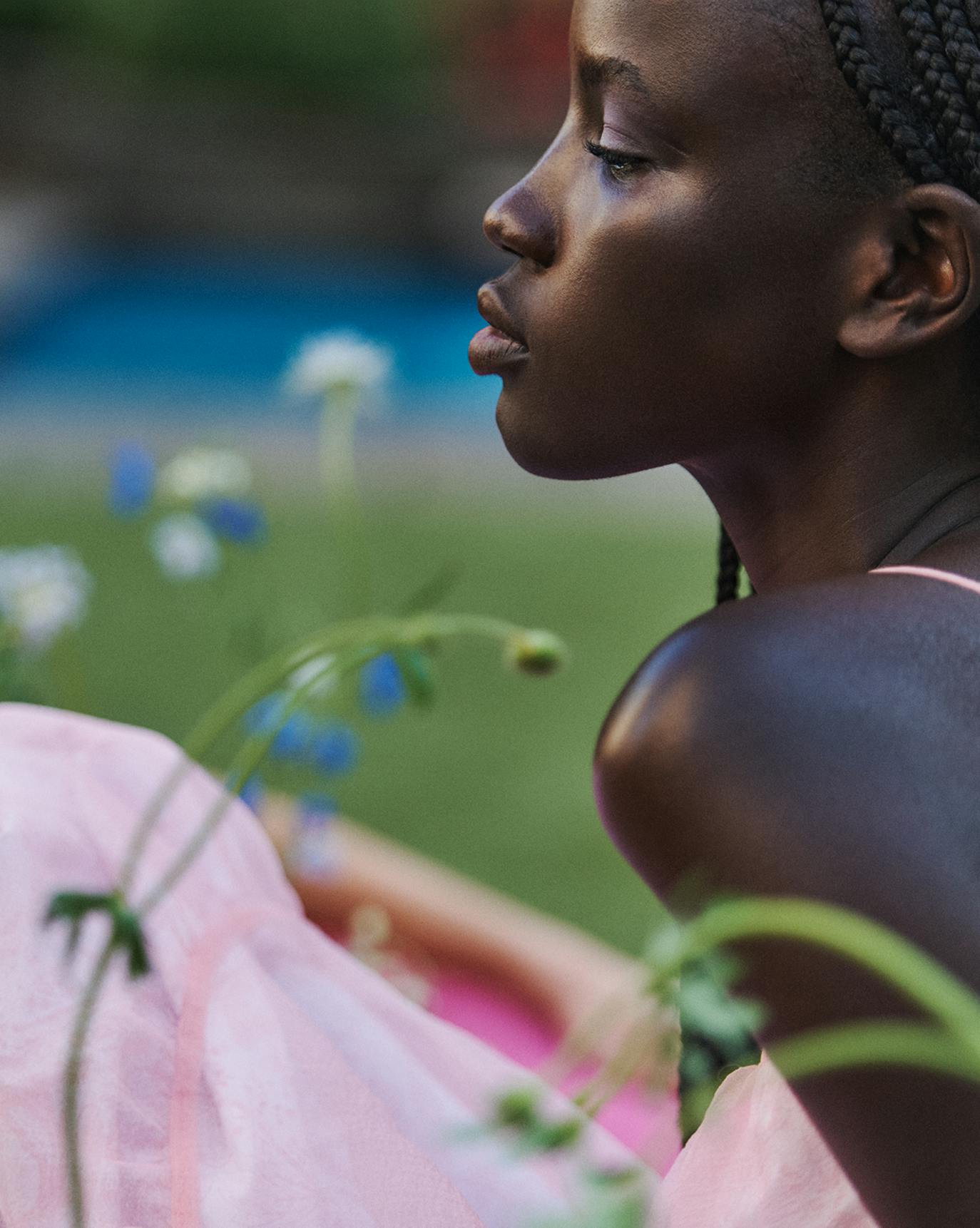 Mayor wears Glossier You Fleur.