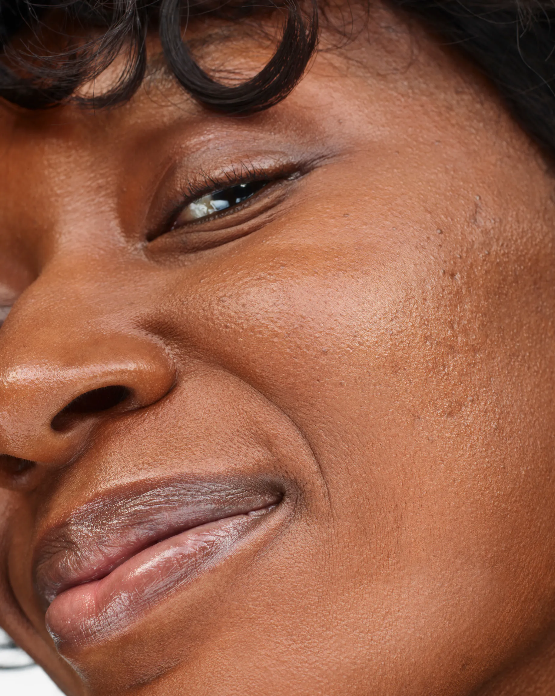 Nana Yaa in Stretch Fluid Foundation, D3.