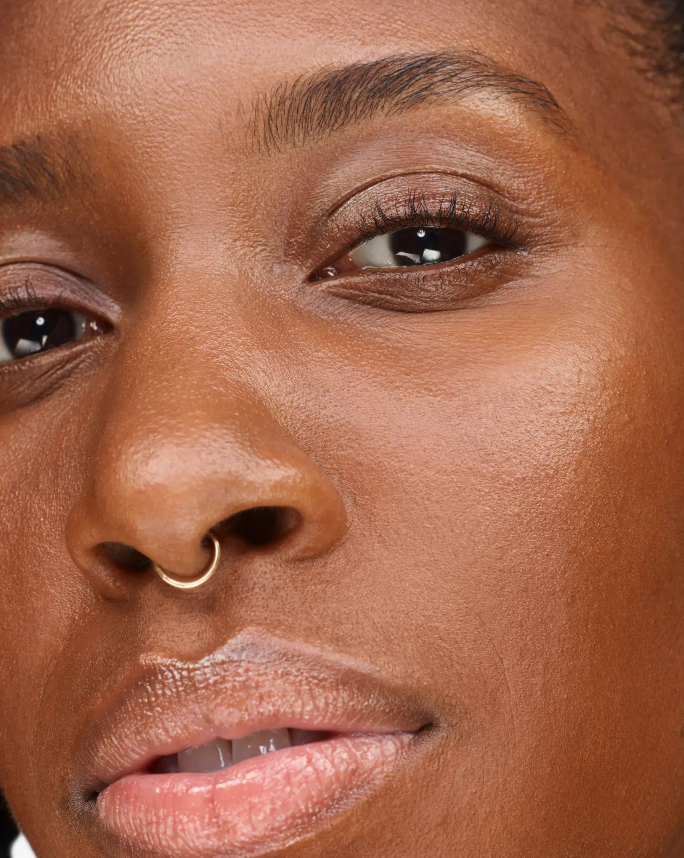 Funmi in Stretch Fluid Foundation, D4.
