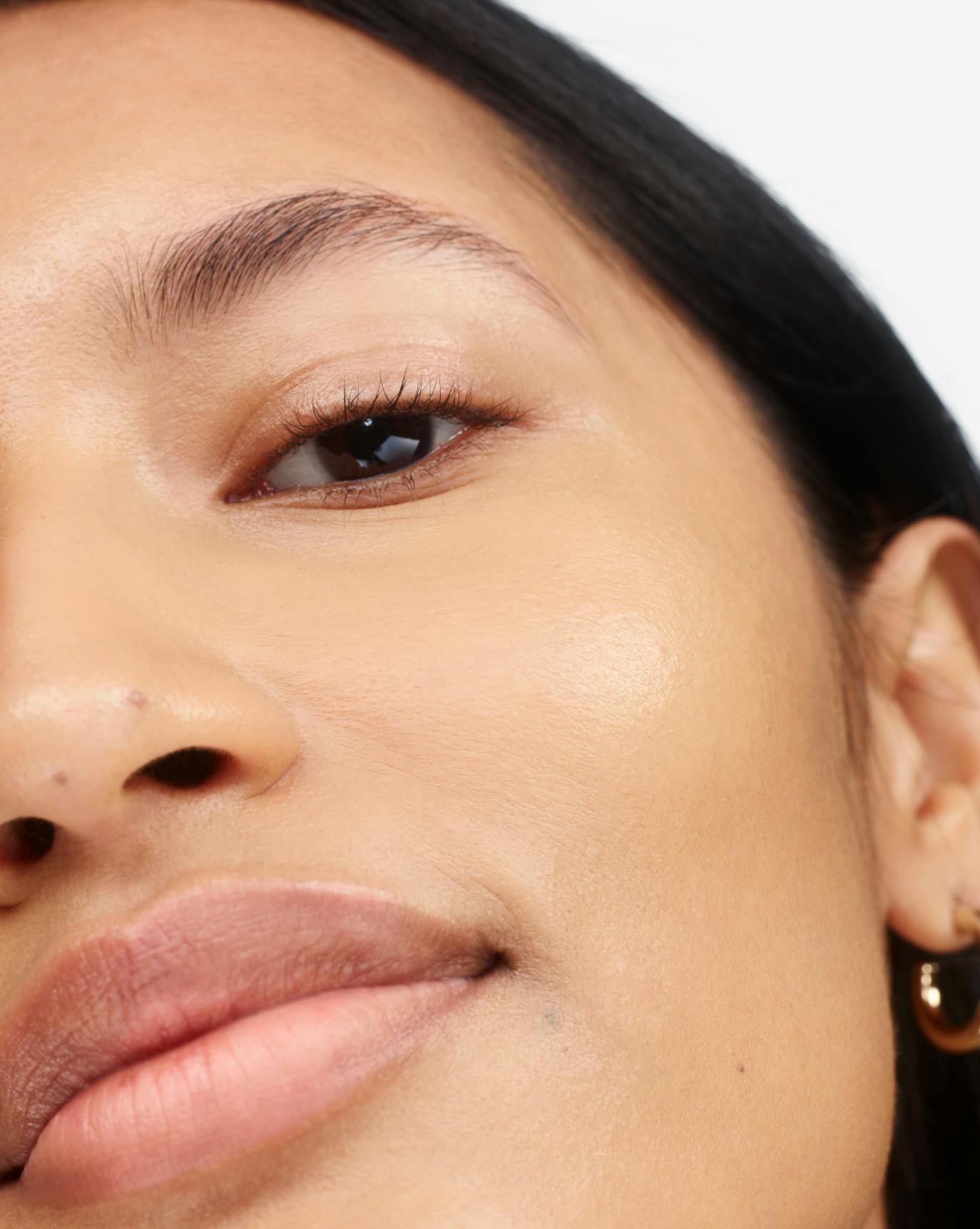 Thasfia in Stretch Fluid Foundation, MT1.