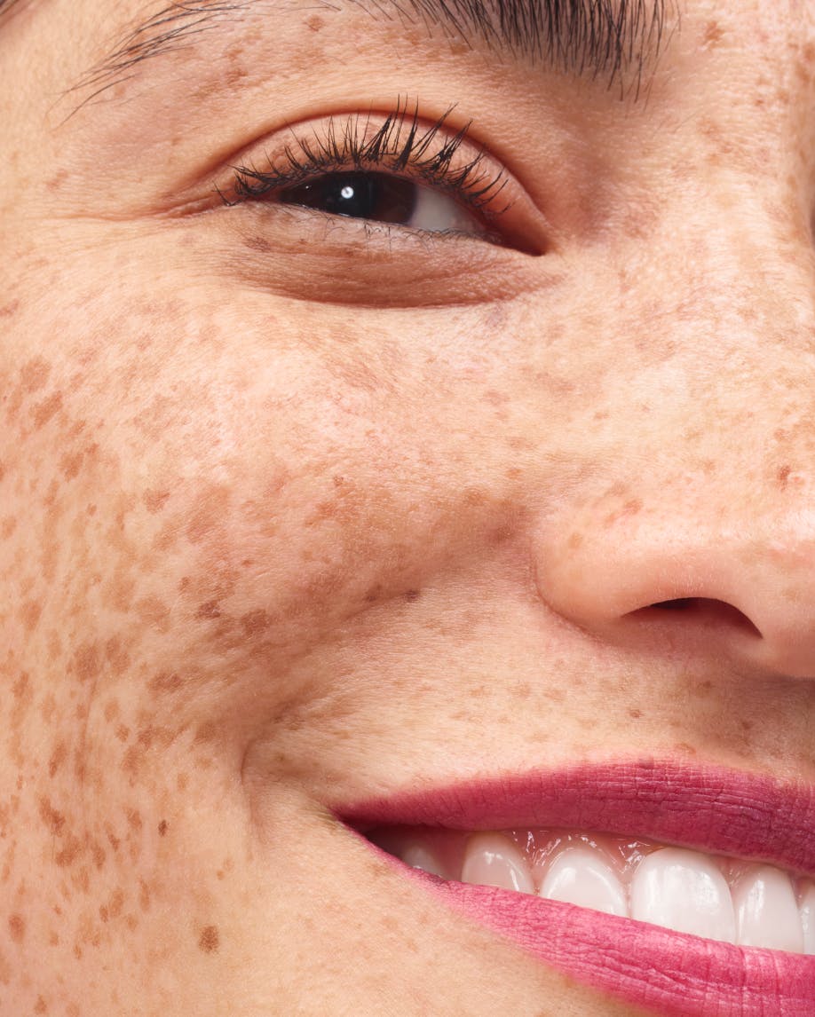 close up half a person's face wearing generation g in jam on lips