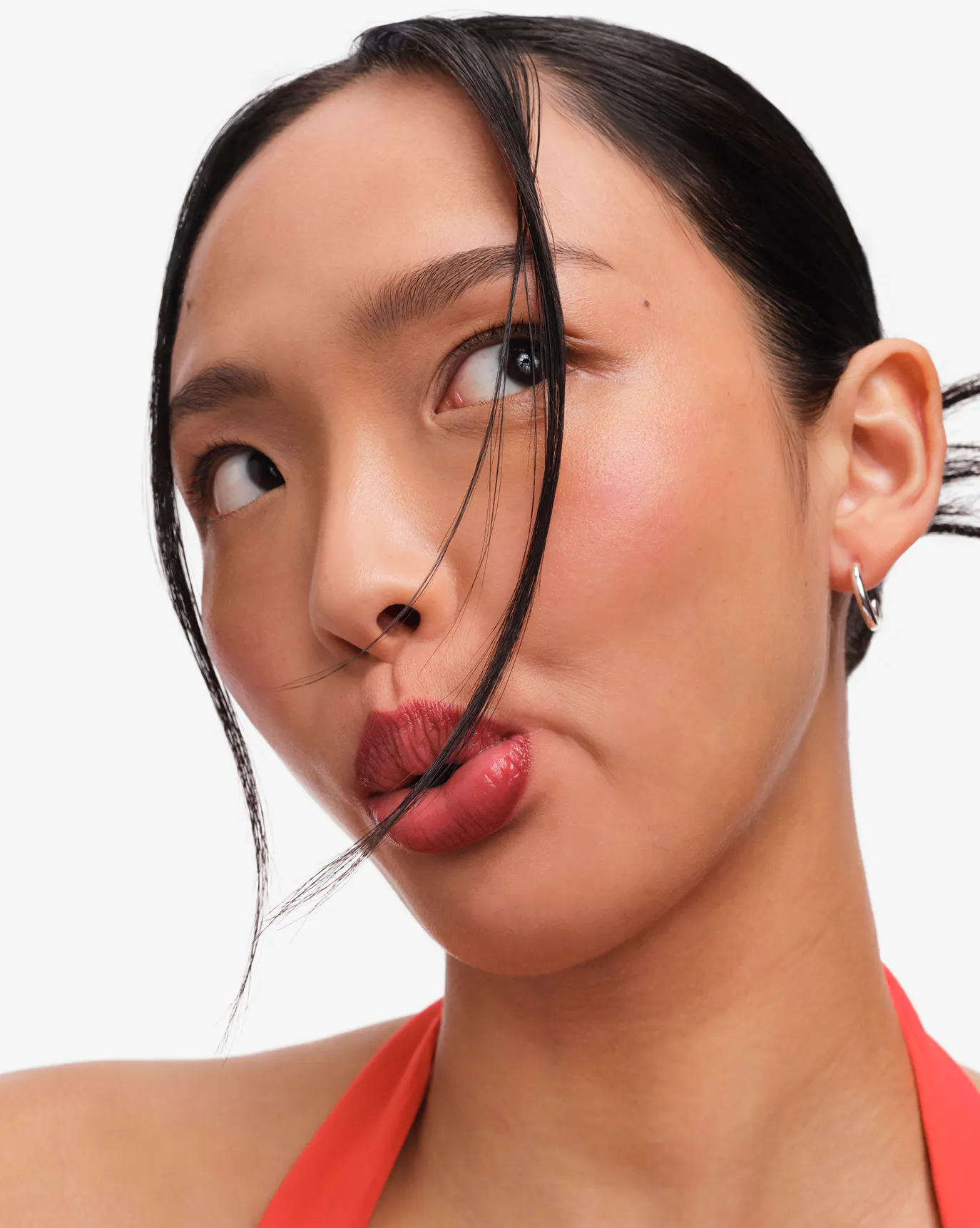 Joy wears The Black Cherry Lip Line + Balm Dotcom.