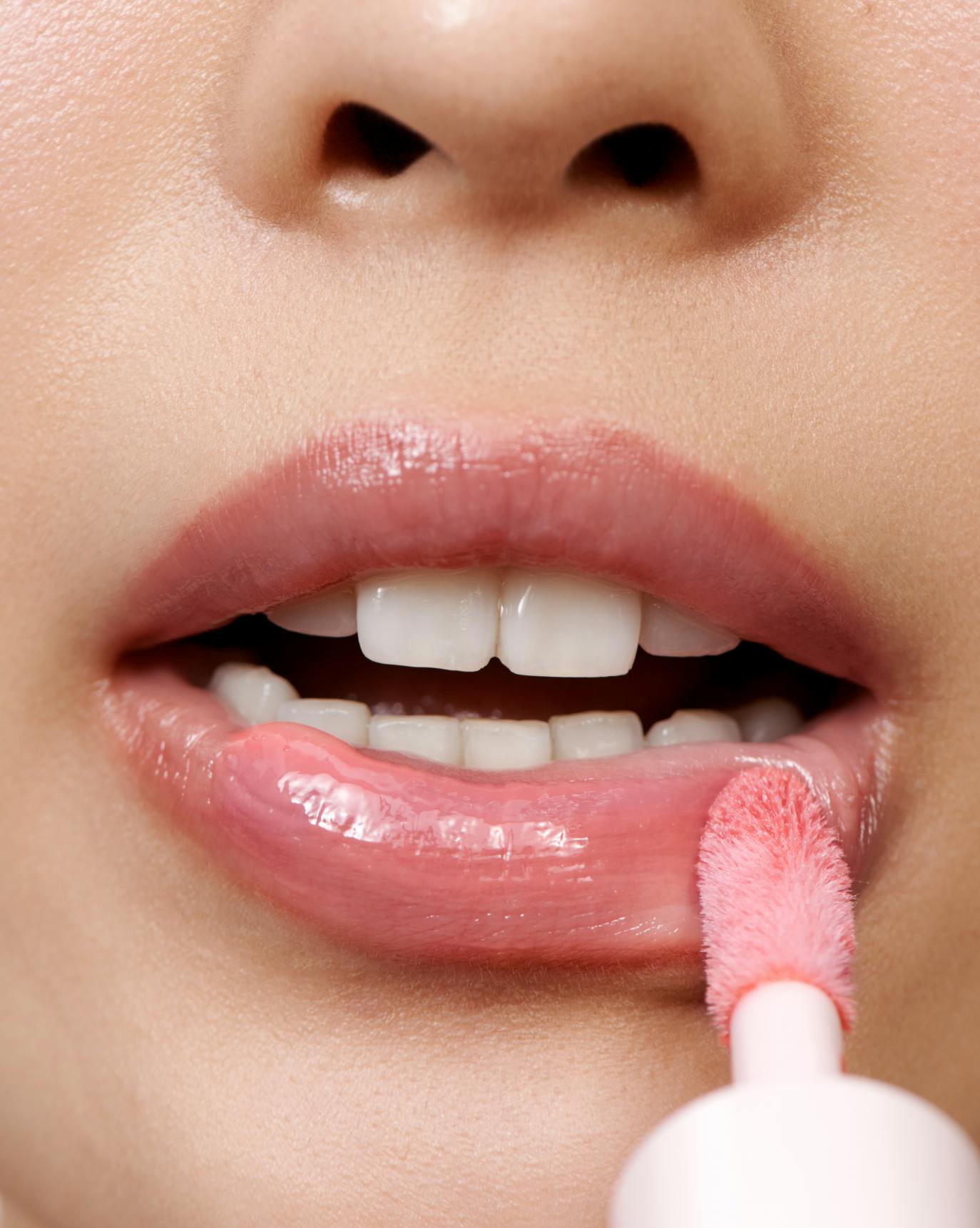 Alison wears Lip Glaze in Chilly.