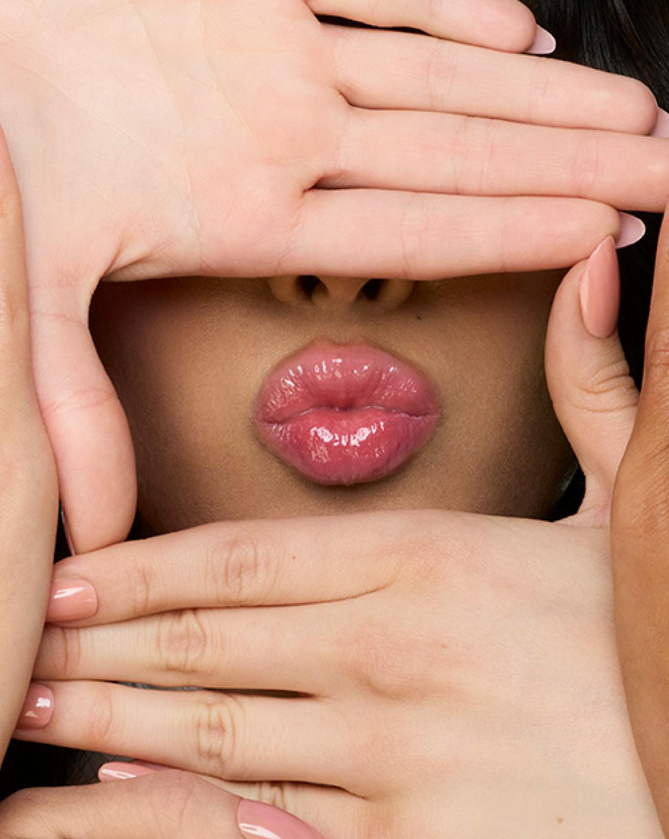 Sophia from KATSEYE wears Lip Glaze in Chilly.