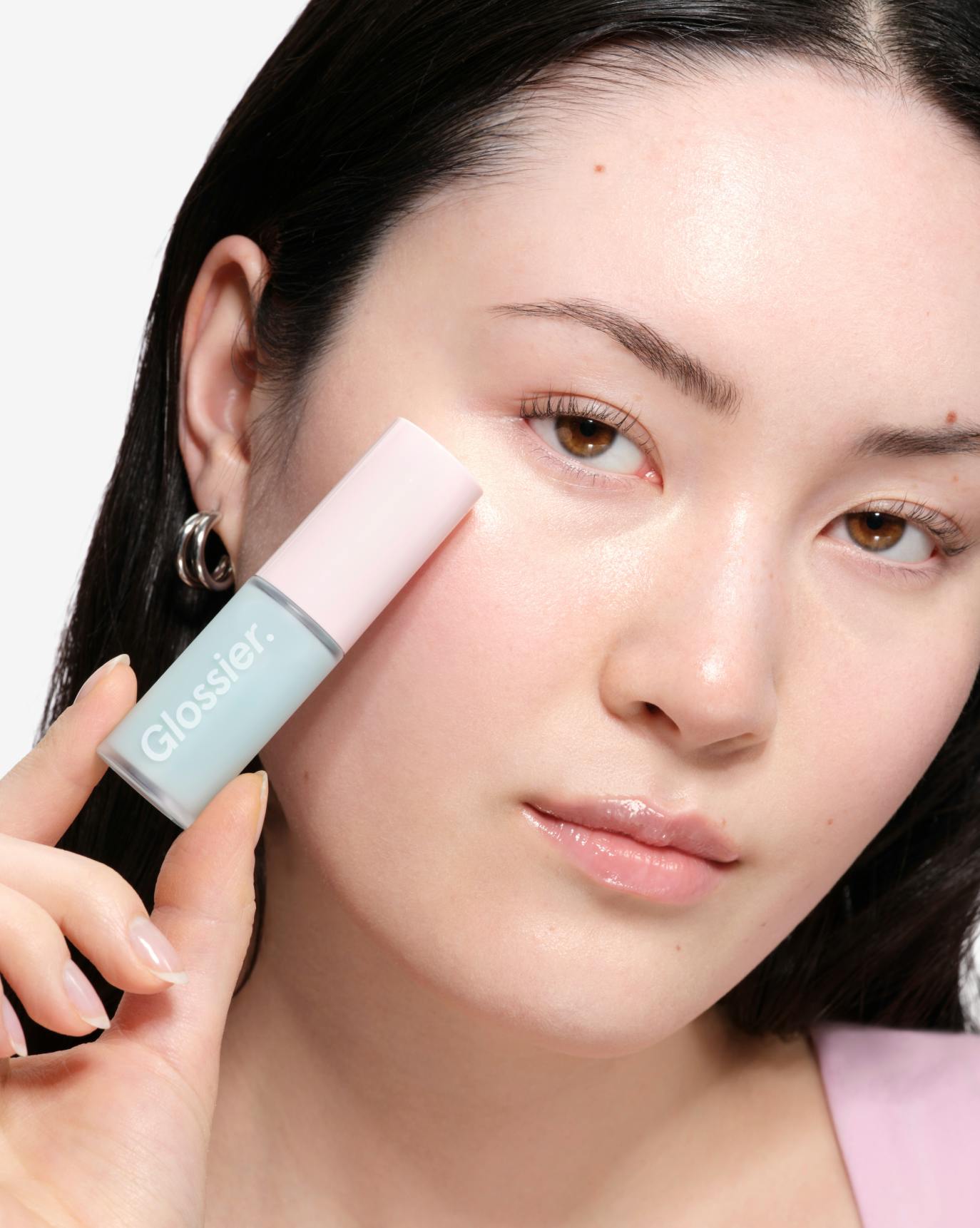 Tallulah wears Lip Glaze in Icy.