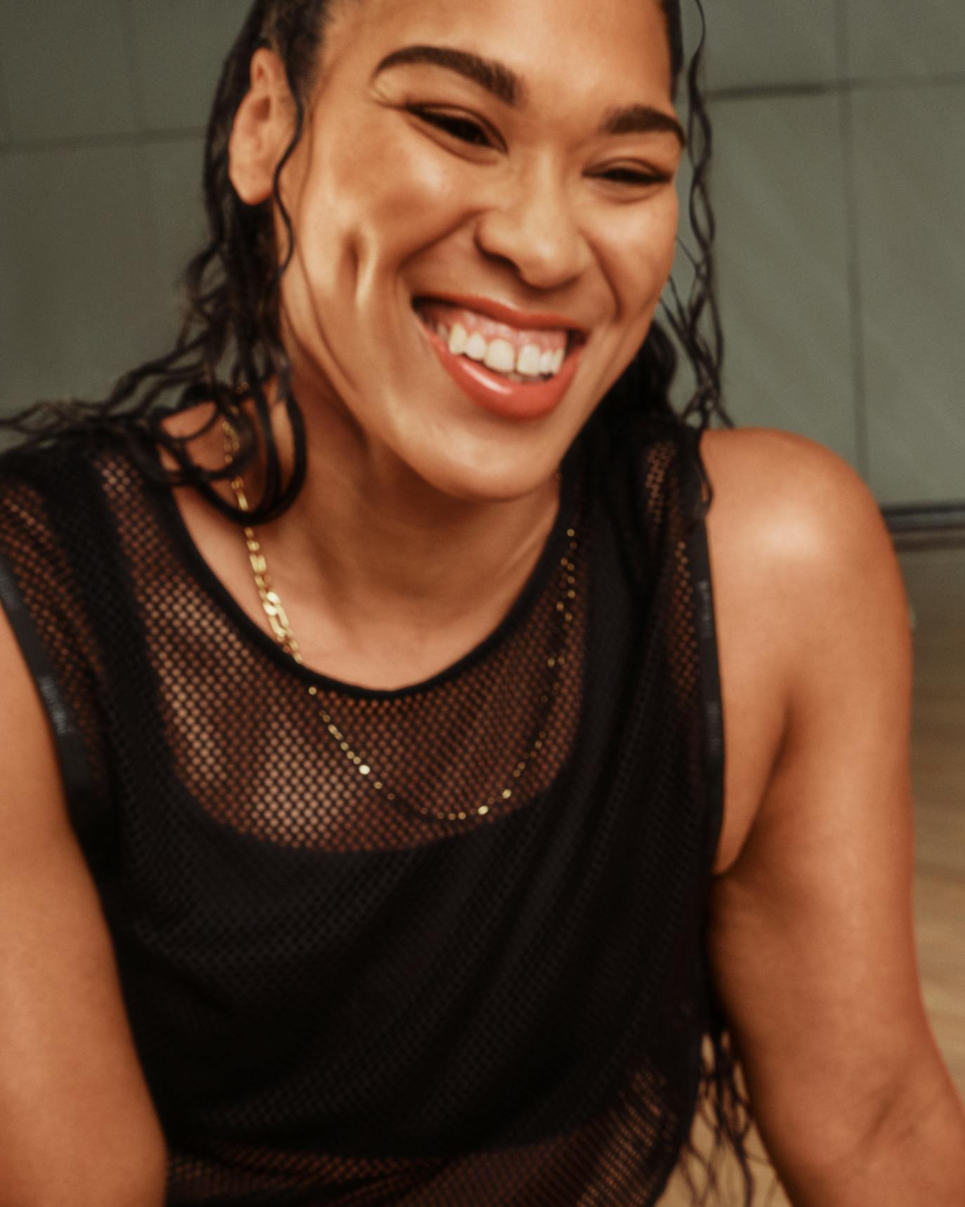 Brionna wears Lip Gloss in Bronze.