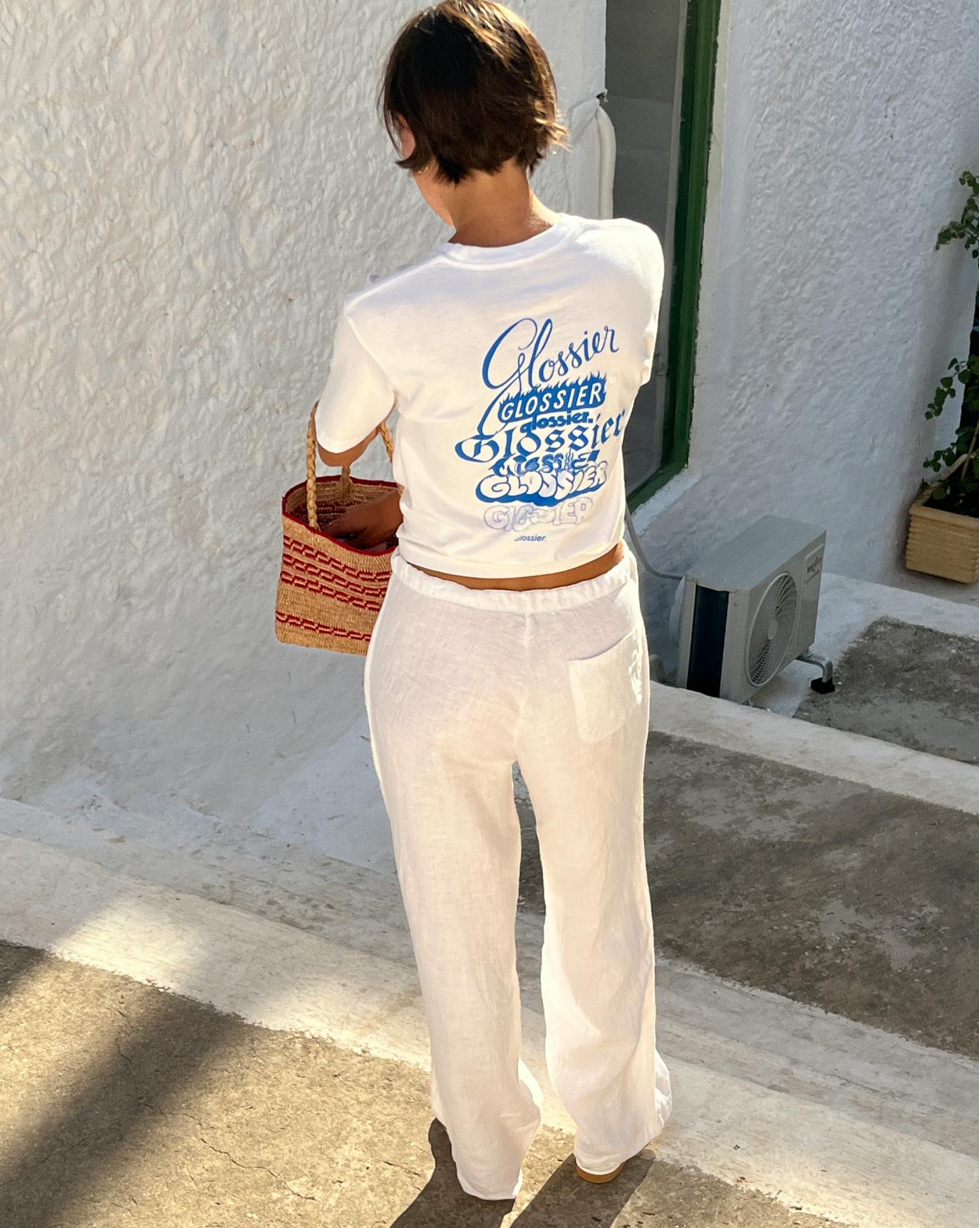 Gabriella wears the Logo Tee.