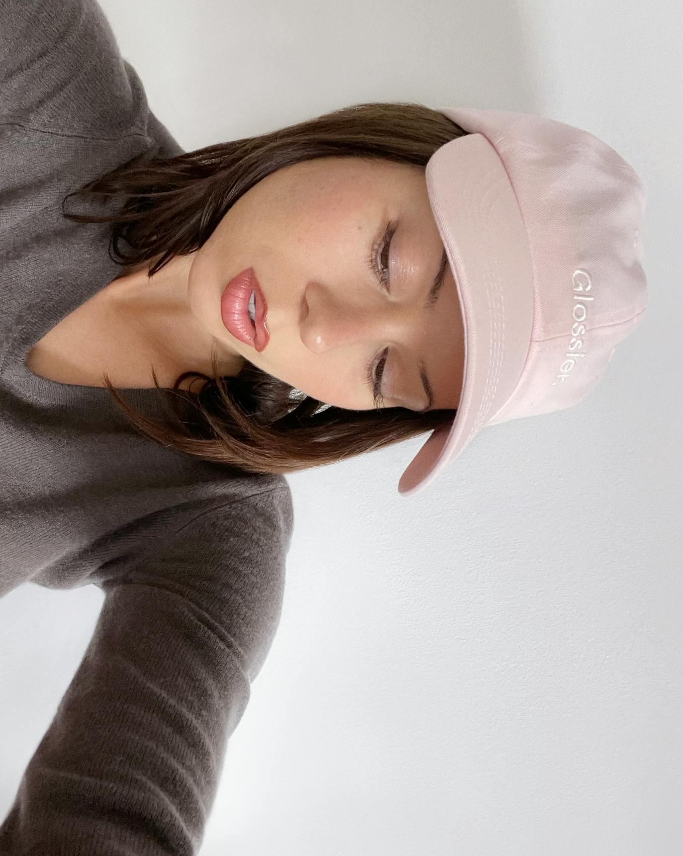 Brigitte wears our Classic Cap in Glossier Pink.