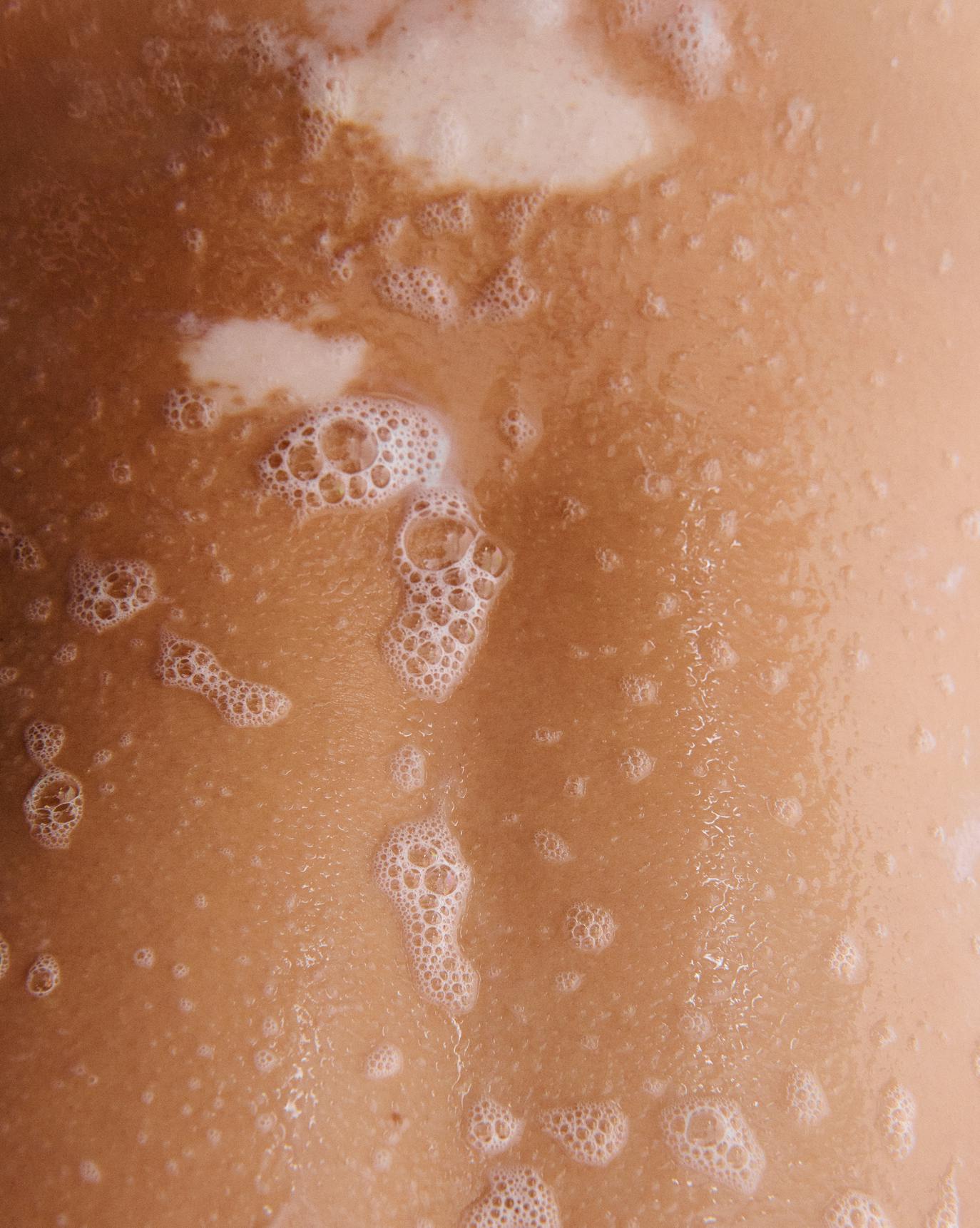 Danielle wears Daily Oil Wash in Sandstone.