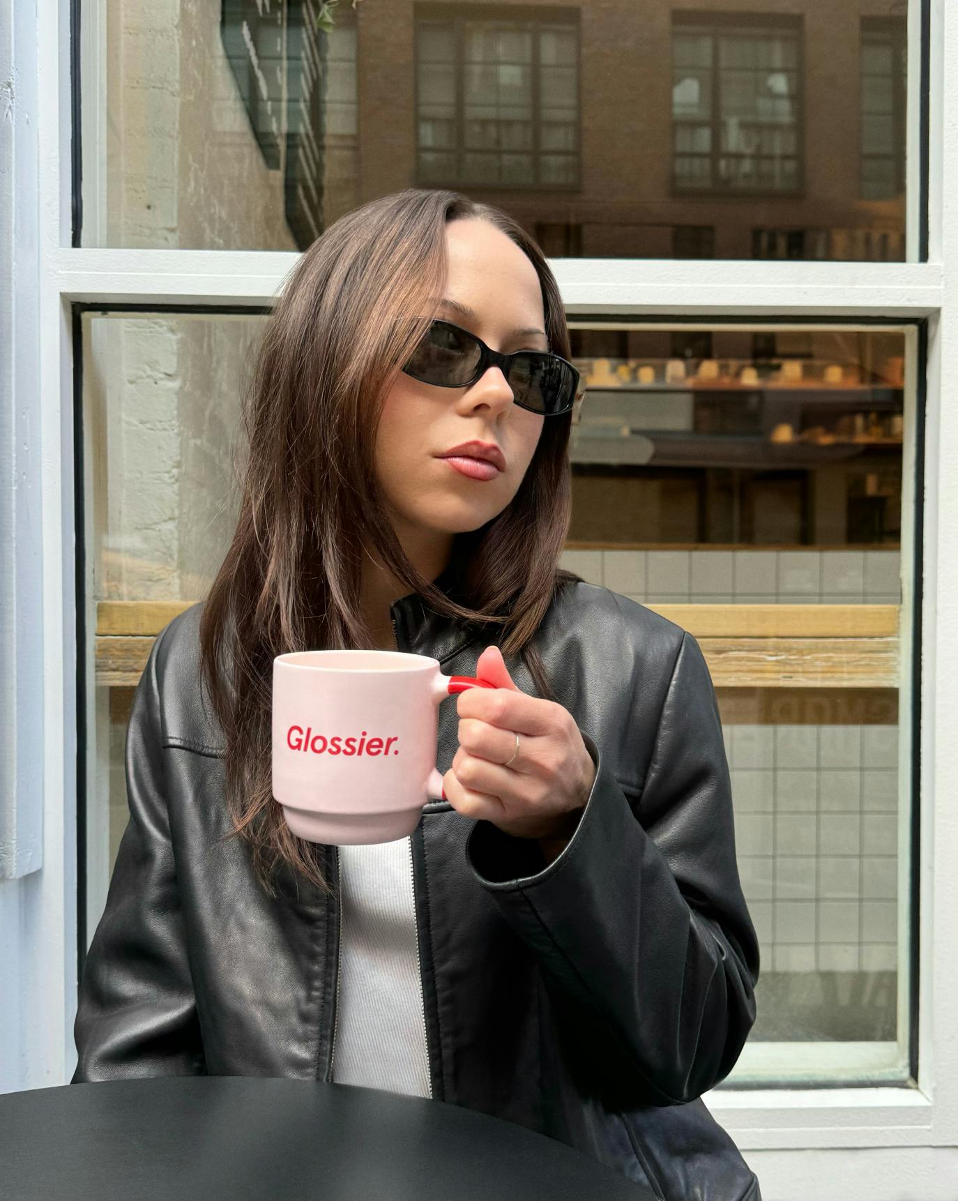 Brigitte with our Three Eyed Smiley Mug.