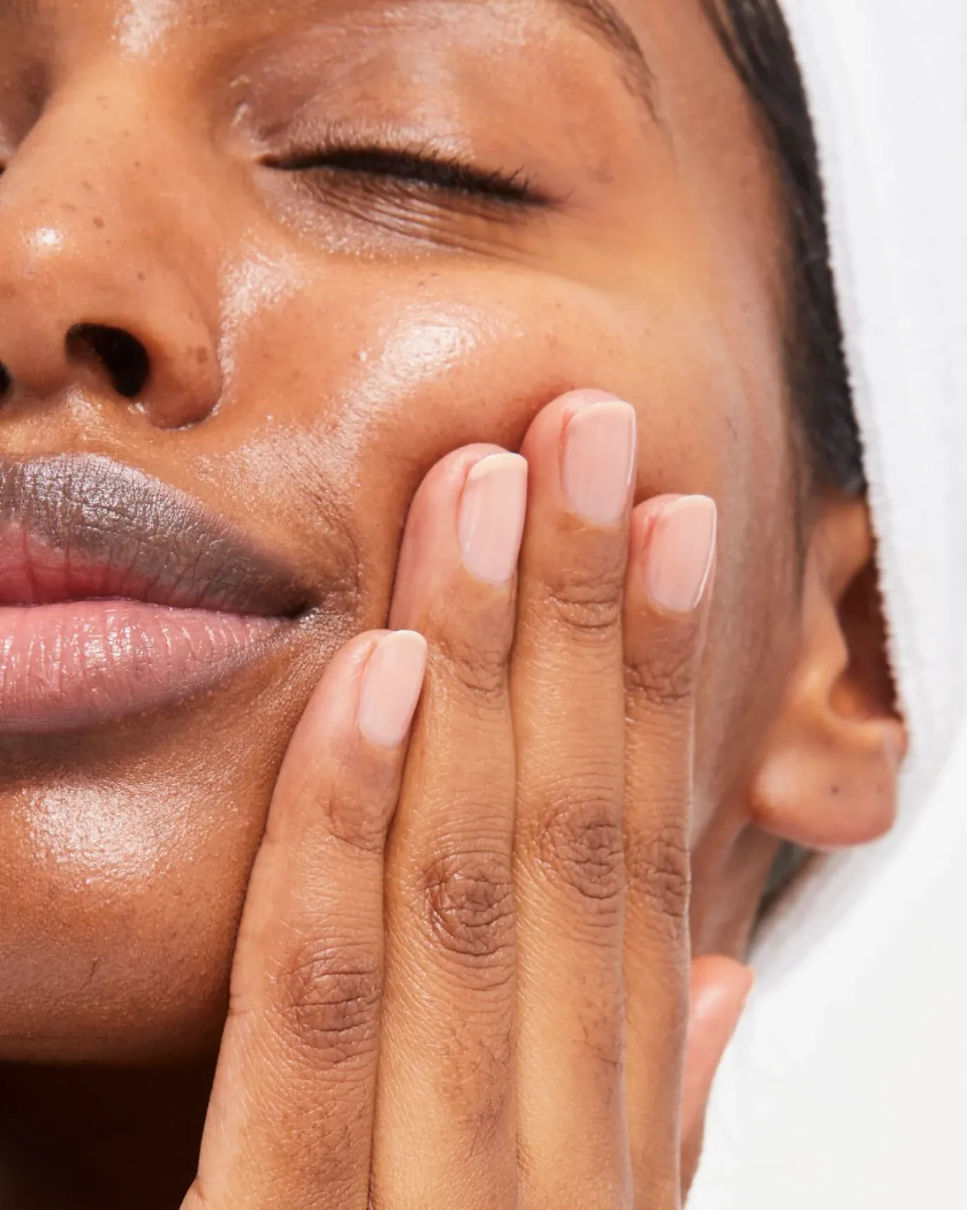 Sabrina moisturizes with After Baume.