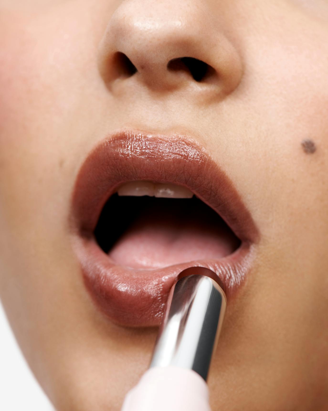 Tess wears Ultralip in Crest.