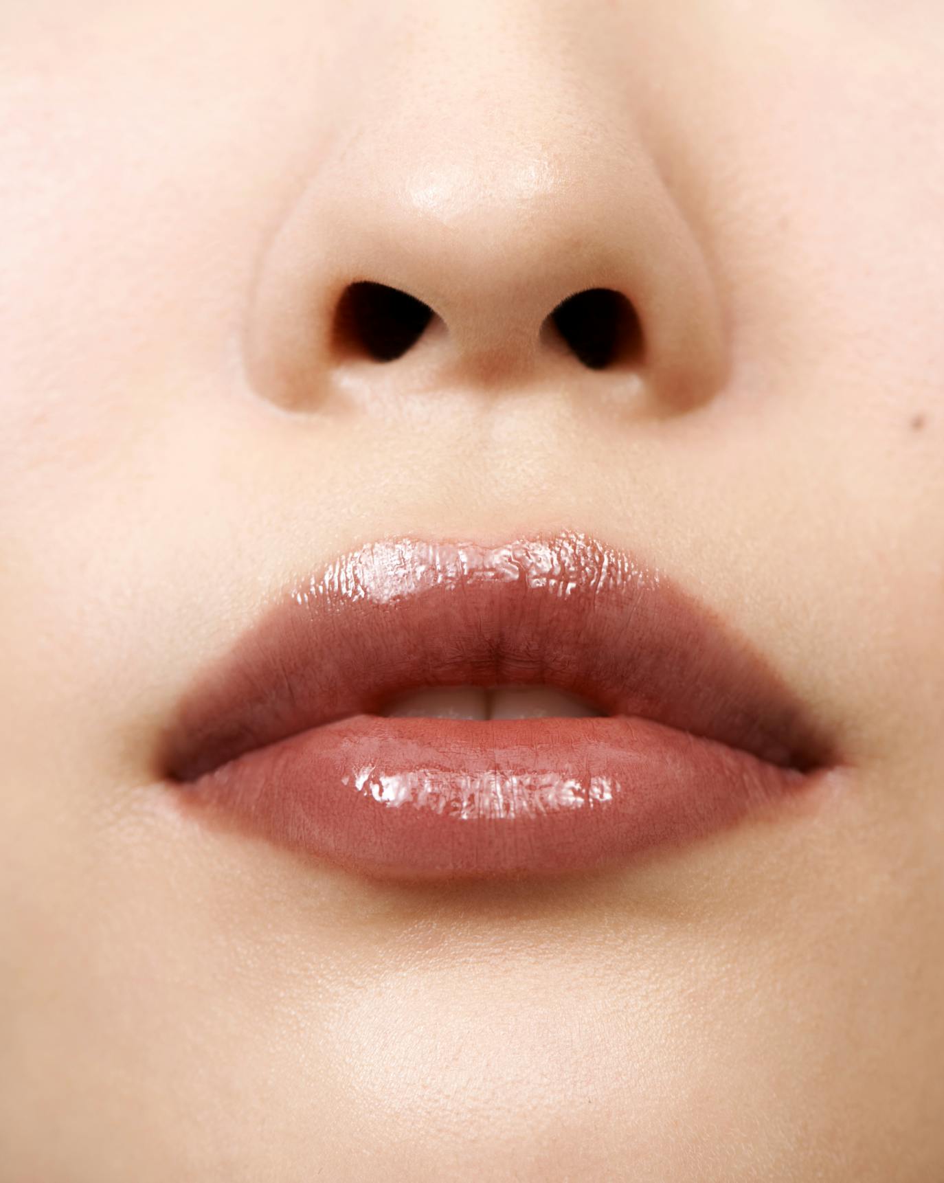 Alison wears Ultralip in Crest.