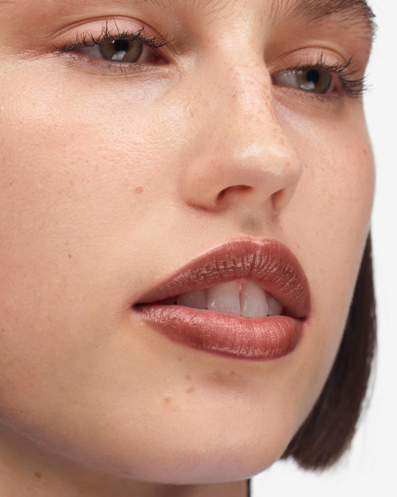 Chloe wears Ultralip in Cachet.