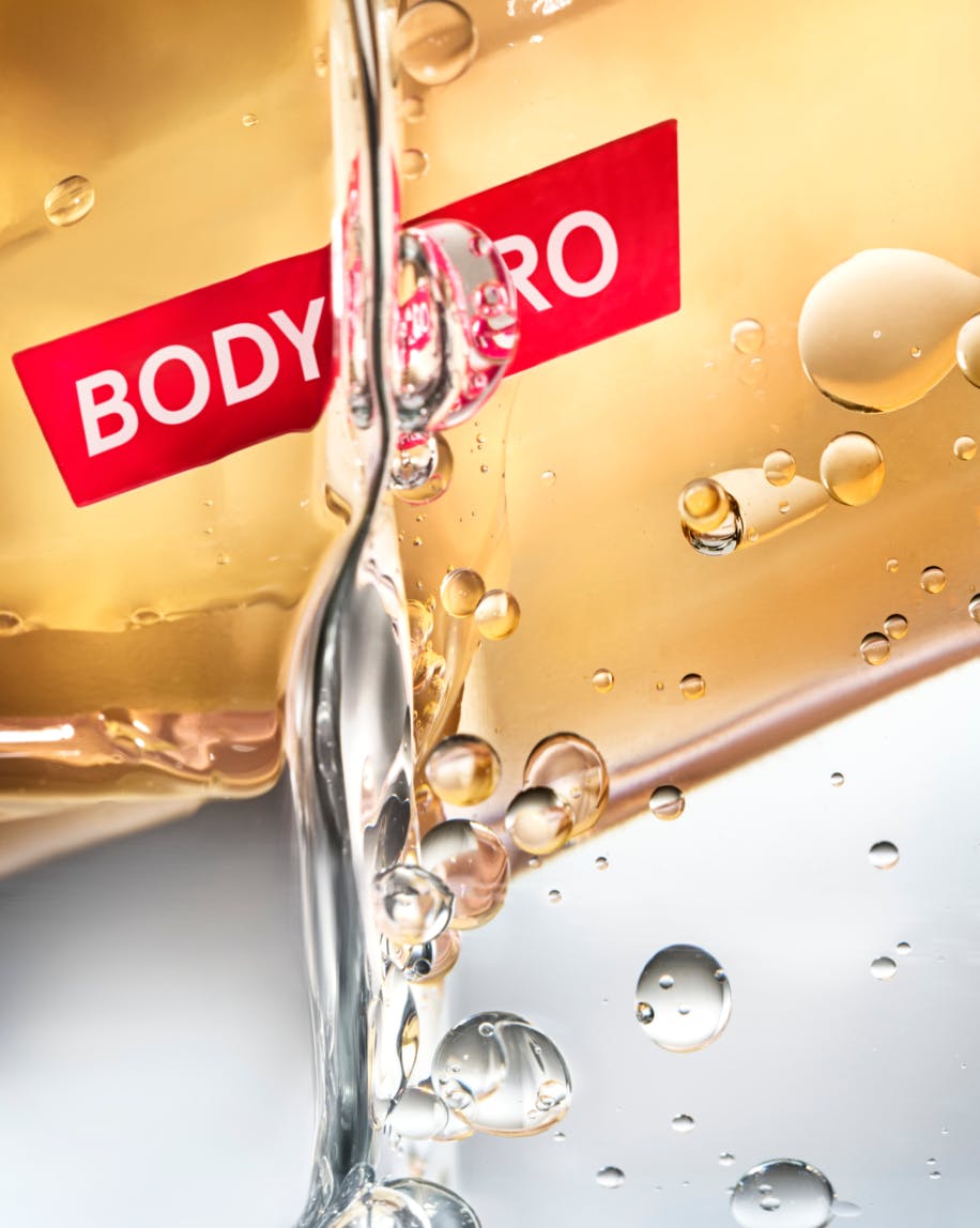 close up of body hero dry touch oil mist bottle