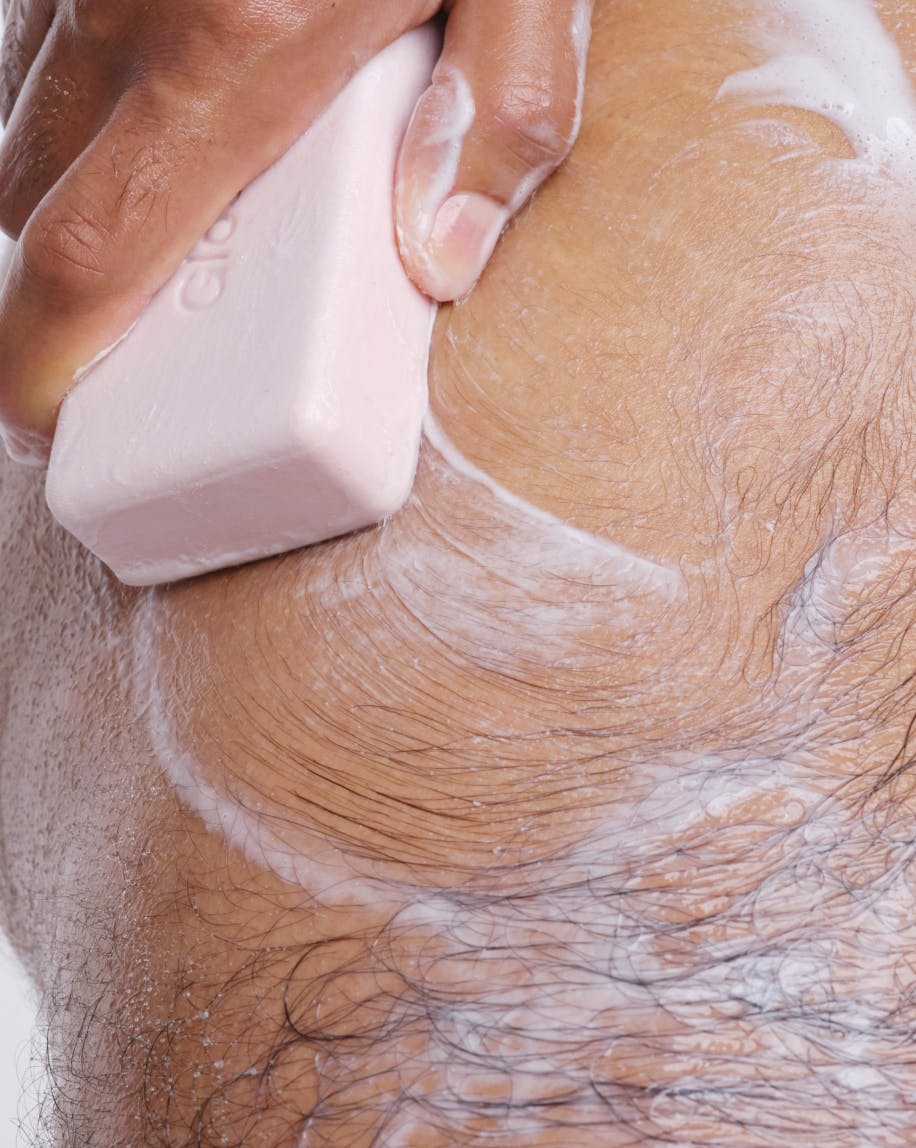 Lather of Exfoliating Bar on skin.