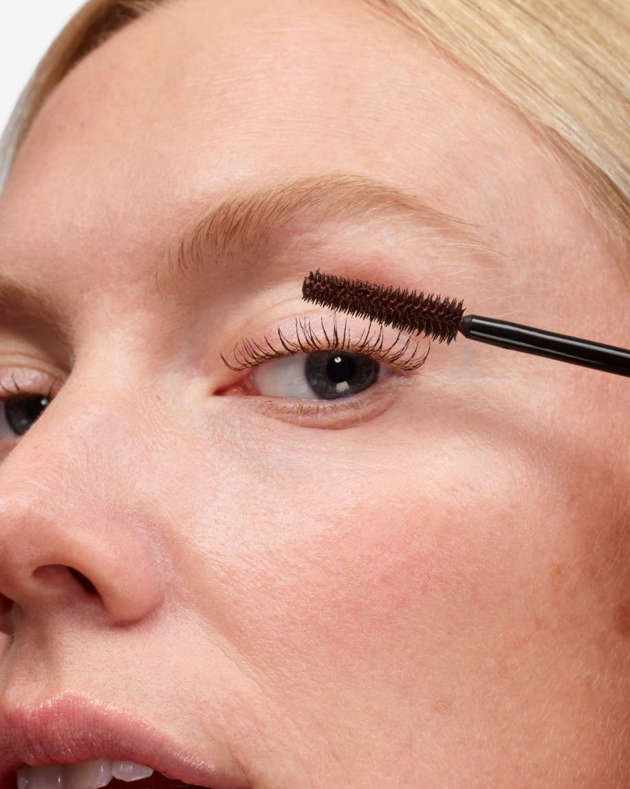 Robin applies Lash Slick in Brown.