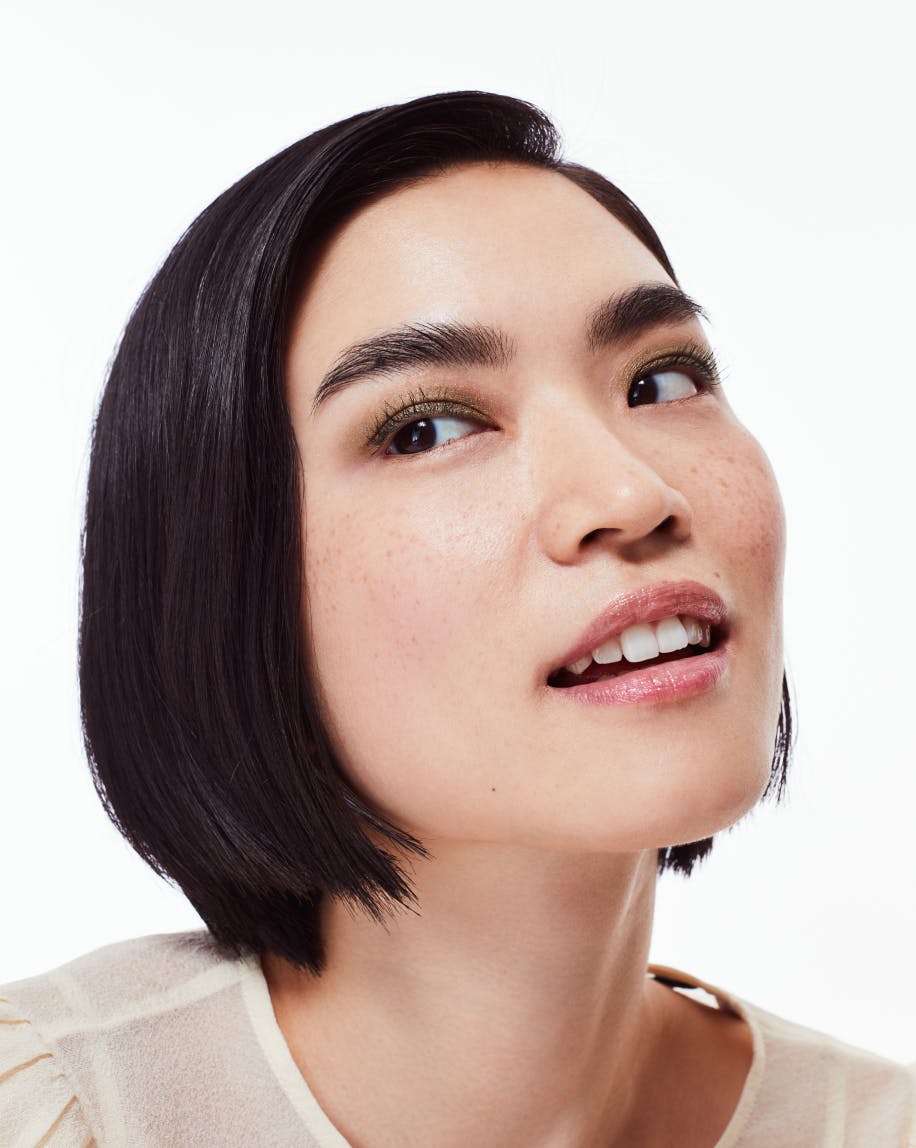 Model wears Lidstar in Herb.