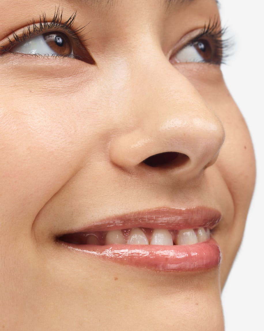 model wearing clear lipgloss