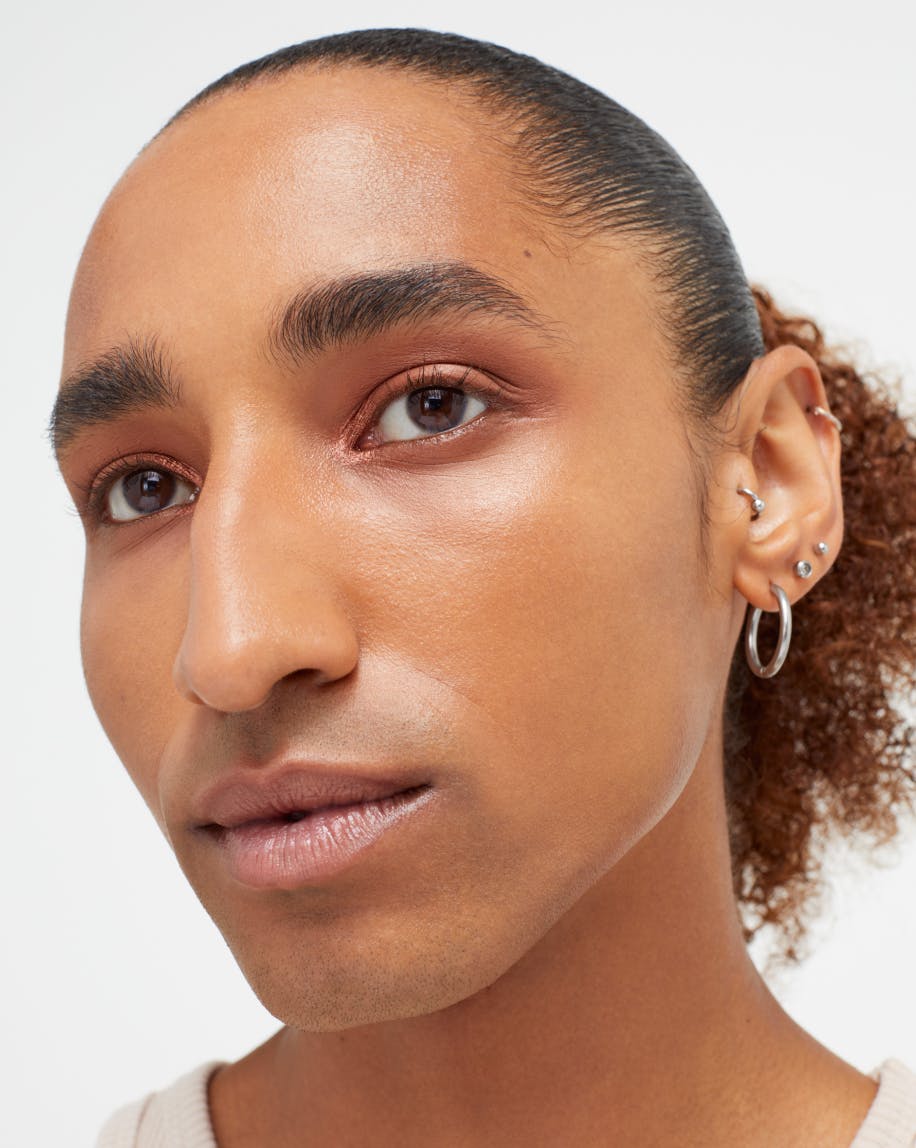 model wears monochromes in Clay