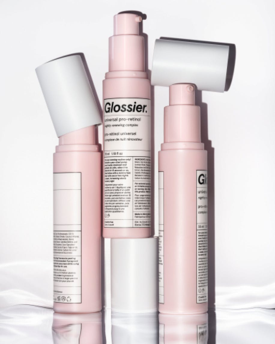 Artistic product shot of three Universal Pro-Retinol bottles